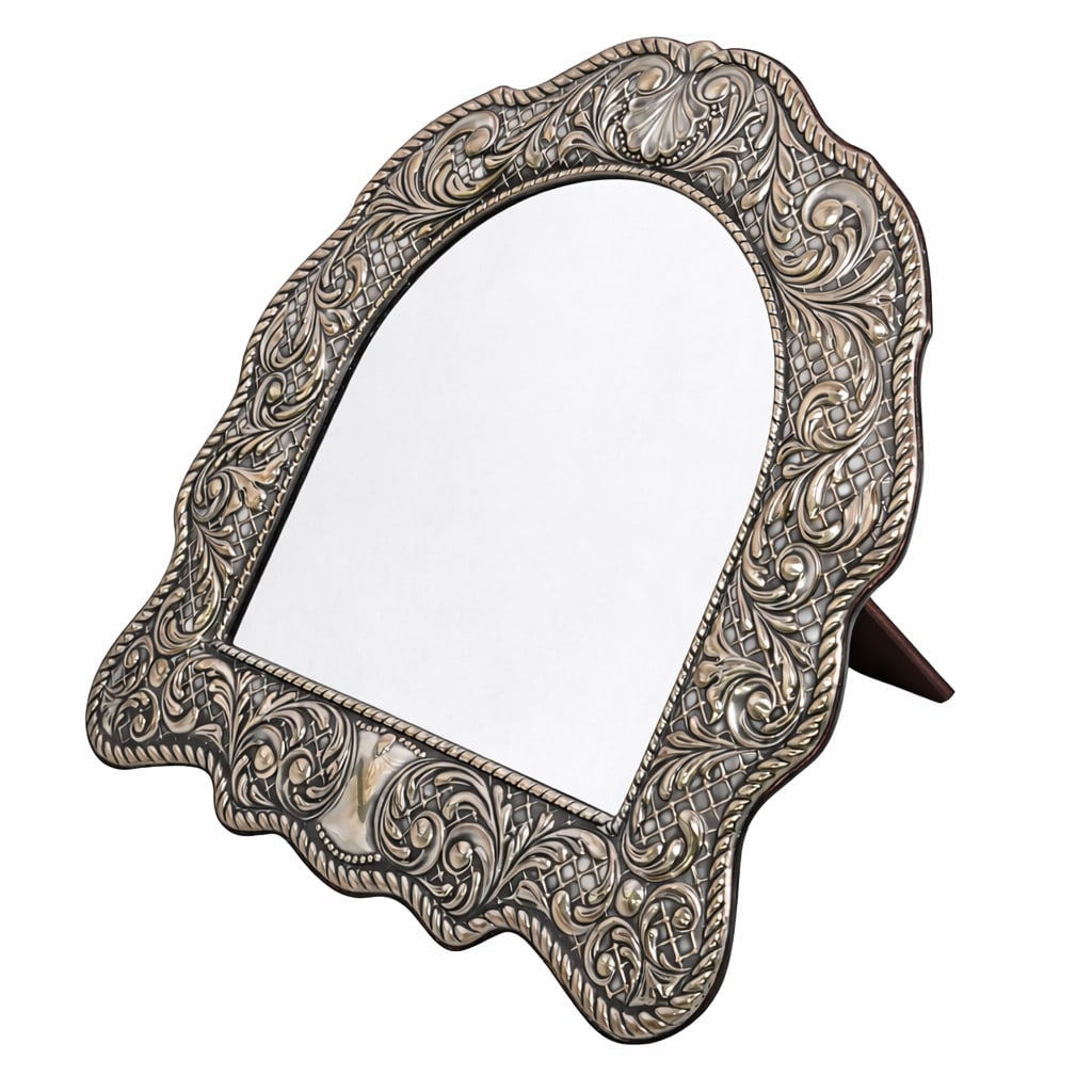 Italian Repousse Sterling Silver Vanity Mirror: Italian Repousse Sterling Silver Vanity Mirror Late 20th century, Italian Arched dressing table mirror in an ornate sterling silver frame decorated with intricate latticework, scrolling foliage,