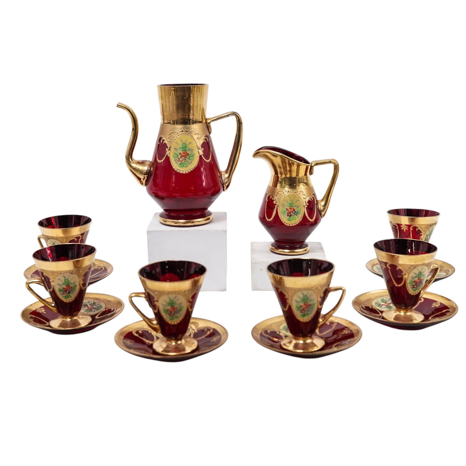 (14 Pc) Bohemian Gilt Cranberry Glass Coffee Service Set: (14 Pc) Bohemian Gilt Cranberry Glass Coffee Service Set20th centuryA fourteen piece set of Bohemian gold plated cranberry glass coffee service, in cranberry color, with gold plated accents and hand p