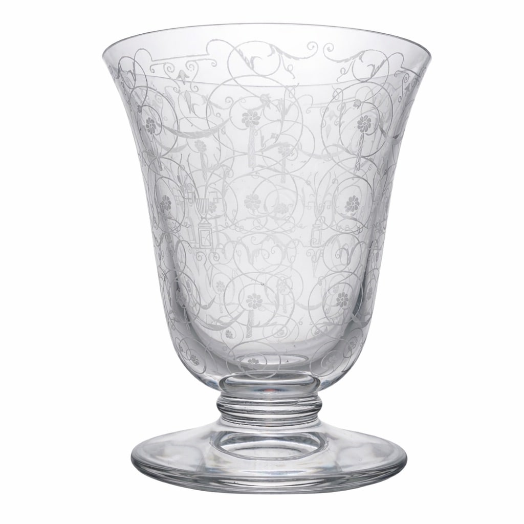 Baccarat "Michelangelo" Crystal Vase: Baccarat "Michelangelo" Crystal Vase20th century, FrenchMichelangelo vase, a highly celebrated design from the prestigious French crystal house. It features a flared "tulip" shape on a short, stable p
