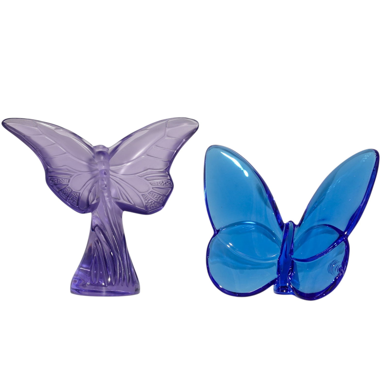 (2 Pc) Lalique & Baccarat Crystal Butterfly Figurines: (2 Pc) Lalique & Baccarat Crystal Butterfly Figurines20th century, FrenchLalique & Baccarat Crystal Butterfly Figurines. Includes:(1) Lalique crystal "Butterfly" figurine in purple color. Marked with