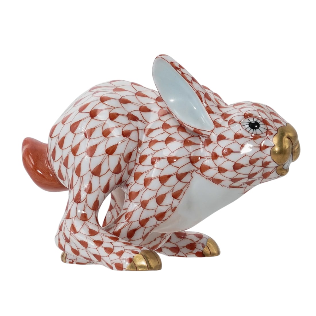 Herend Porcelain "Fleeing Rabbit" Rust Fishnet Figurine: Herend Porcelain "Fleeing Rabbit" Rust Fishnet Figurine20th century, HungarianHerend porcelain figurine depicting a running bunny rabbit in the rust fishnet pattern with 24k gold accents. Marked with