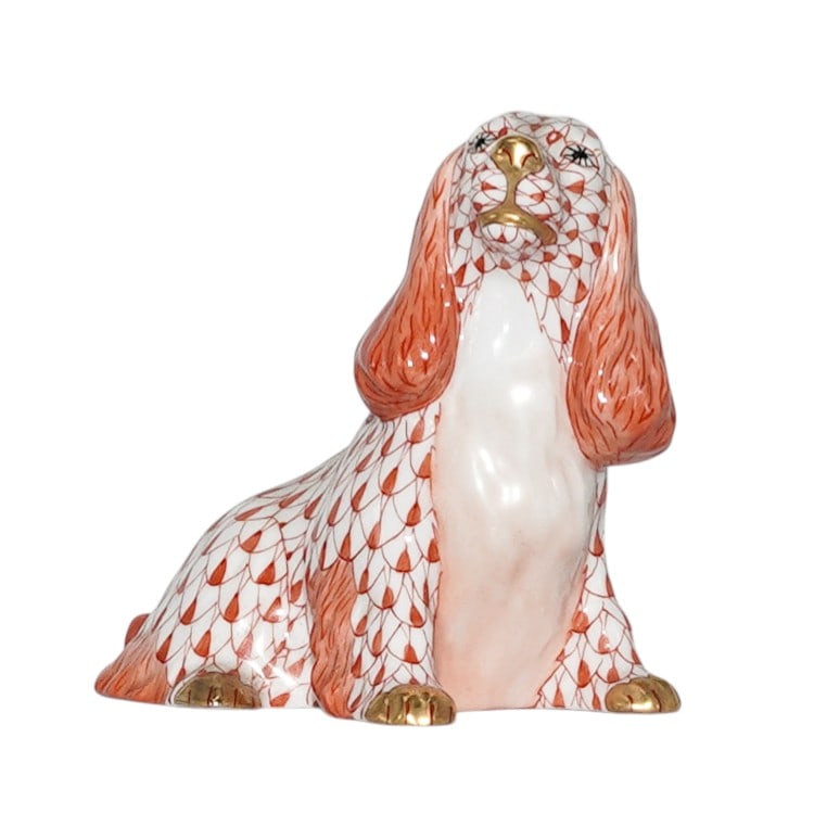 Herend First Edition "Spaniel Sitting" Porcelain Figurine: Herend First Edition "Spaniel Sitting" Porcelain Figurine20th century, HungarianHerend porcelain First Edition dog figurine of a "Spaniel Sitting" embellished in a black hued fishnet pattern. Finished