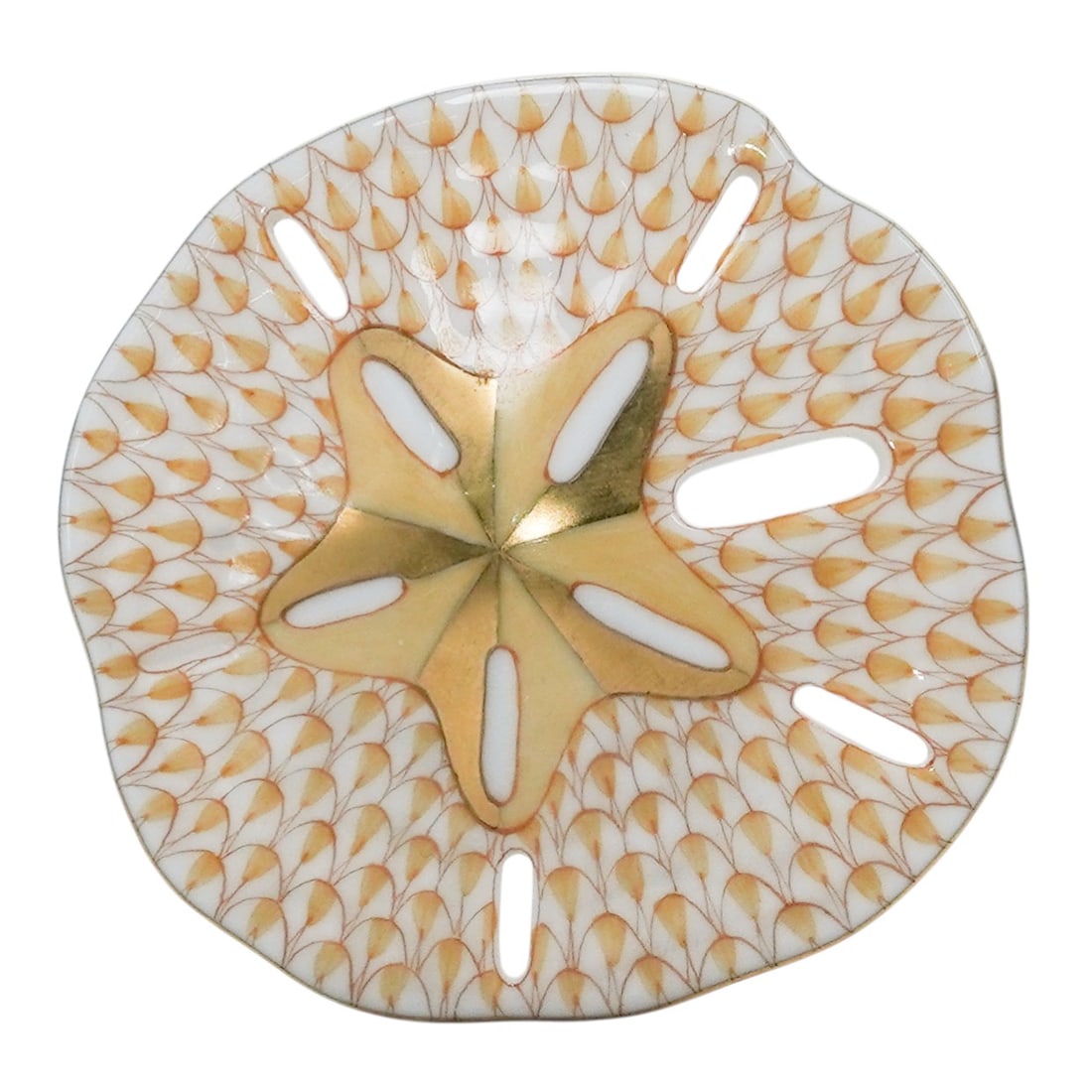 Herend Porcelain "Sand Dollar" Yellow Fishnet Figurine: Herend Porcelain "Sand Dollar" Yellow Fishnet Figurine20th century, HungarianHerend porcelain figurine depicting a sand dollar in the yellow fishnet pattern with 24k gold accents. Marked with Herend h