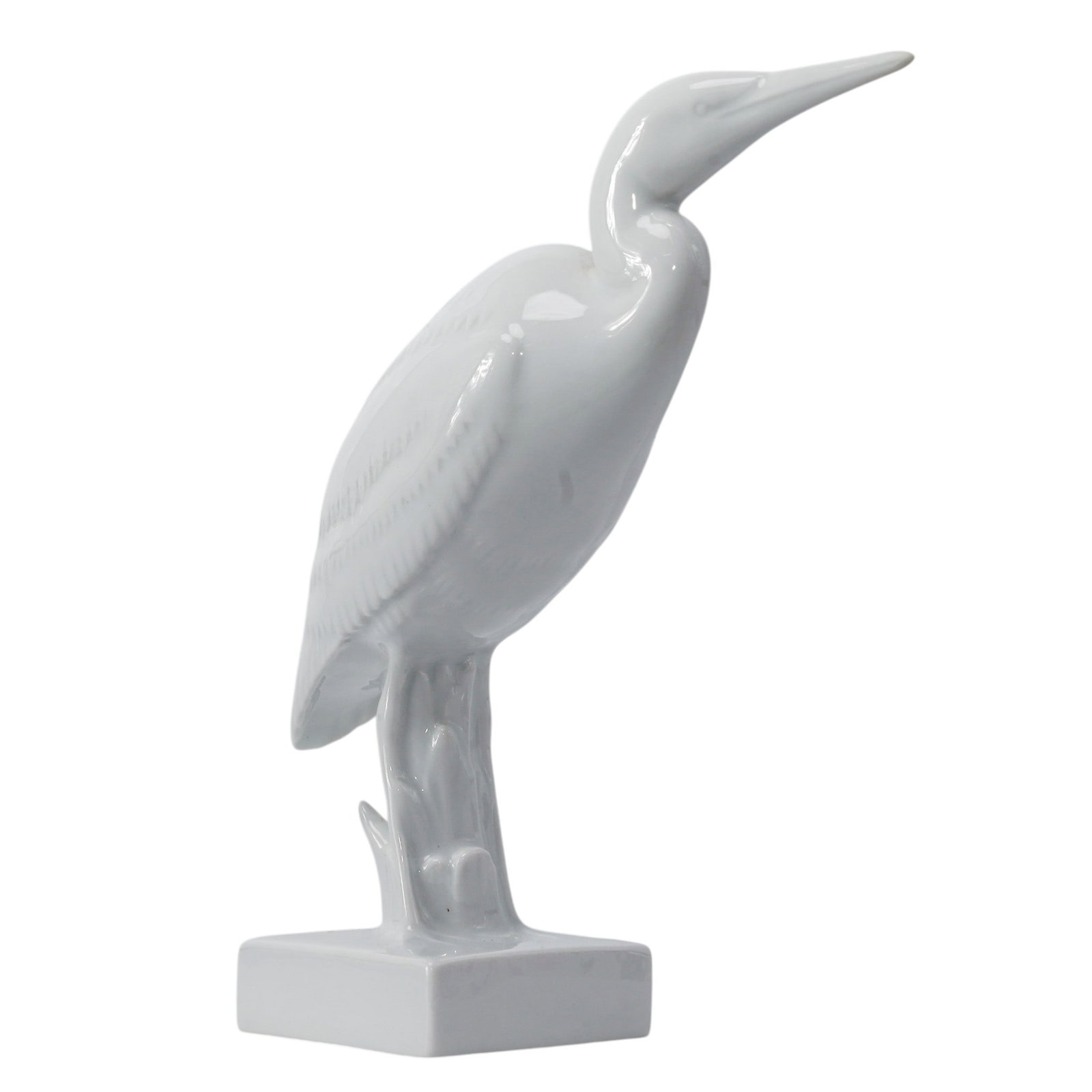 Herend Porcelain "Heron" Figurine: Herend Porcelain "Heron" Figurine20th century, HungarianA Herend porcelain figurine of a "Heron", in an all white gloss glaze. Style: #5177. Marked along the underside with Herend stamps.W: 6 1/2"