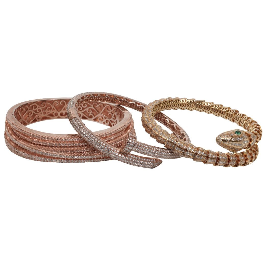 (3 Pcs) Sterling Silver & Cubic Zirconia Fashion Bracelets: (3 Pcs) Sterling Silver & Cubic Zirconia Fashion Bracelets Late 20th Century Group of three sterling silver fashion bracelets, each stamped “925,” comprising varied decorative designs