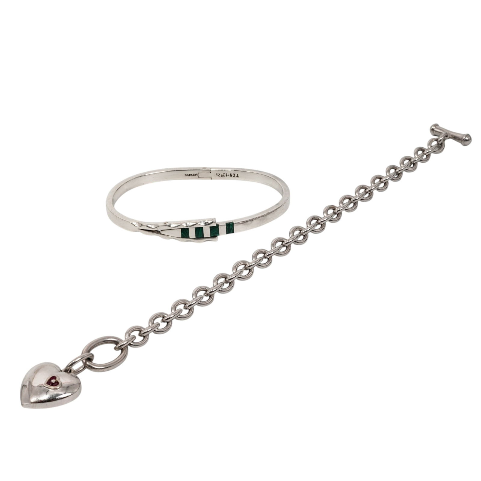 (2 Pcs) Sterling Silver Bracelets: (2 Pcs) Sterling Silver Bracelets Mid 20th Century, Mexico Collection consists of two distinct sterling silver pieces: one artisan-crafted cuff bracelet featuring four channel-set malachite inlay