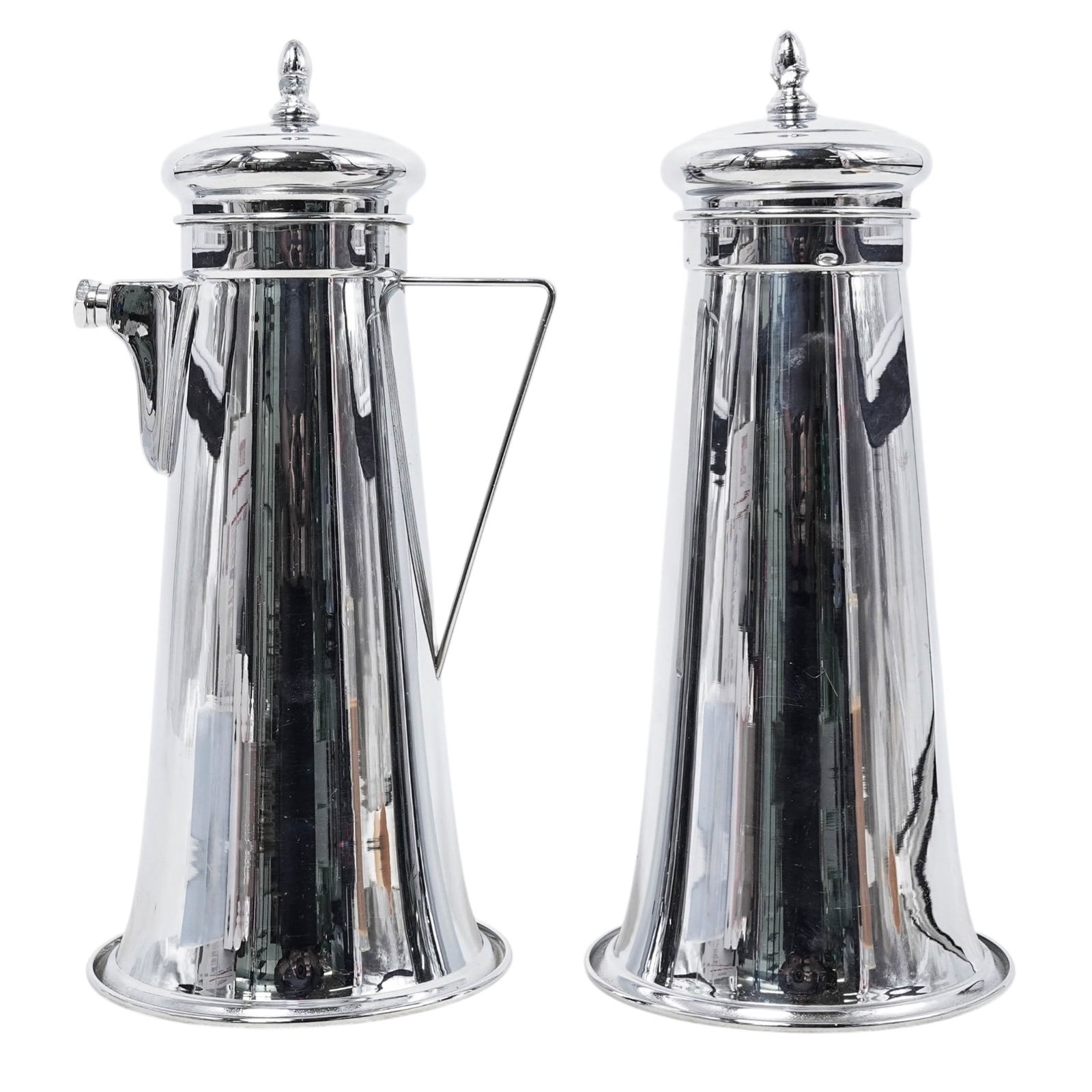 (2pc) Art Deco Forman Brothers Cocktail Shakers: (2pc) Art Deco Forman Brothers Cocktail Shakers1930. AmericanThe Forman Brothers Art Deco cocktail shaker is a celebrated icon of 1930s "Machine Age" design. These shakers are crafted from chromium-pl