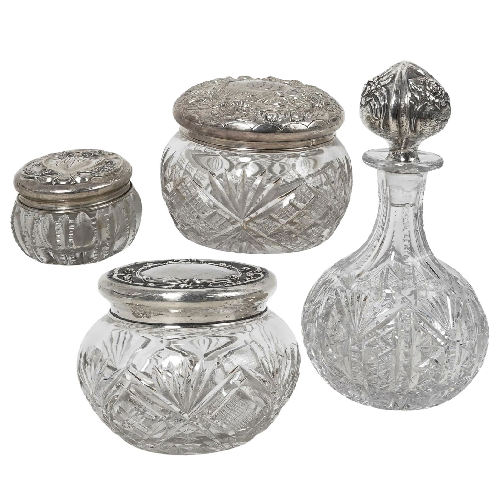 (4 Pc) Antique American Sterling & Crystal Vanity Articles: (4 Pc) Antique American Sterling & Crystal Vanity ArticlesLate 19th-Early 20th century, AmericanEarly 20th c. Gorham cut crystal perfume bottle with a floral sterling silver stopper. The stopper is st