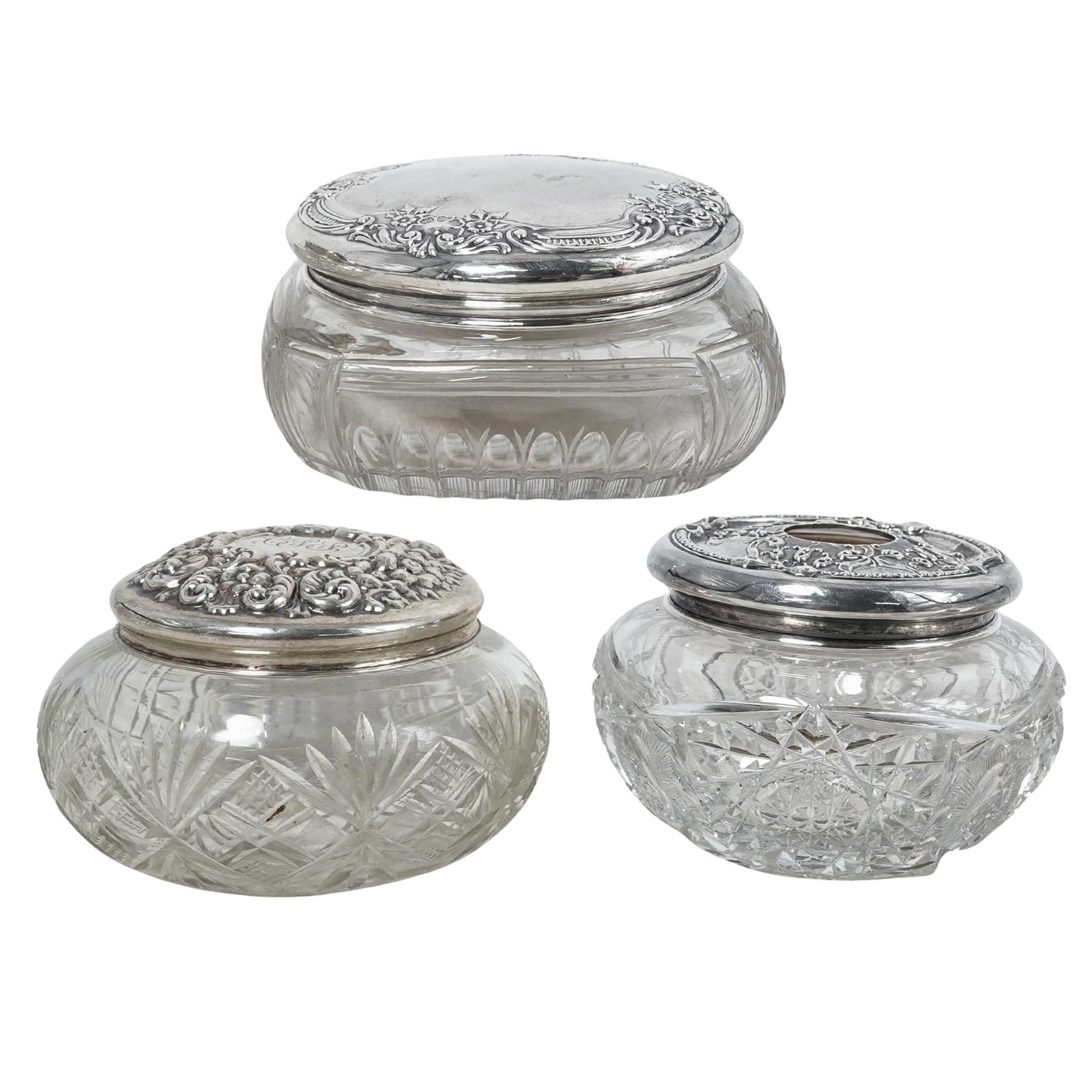 (3 Pc) Antique Sterling Silver & Glass Dresser Vanity Boxes: (3 Pc) Antique Sterling Silver & Glass Dresser Vanity Boxes Early 20th century, Continental A three piece set of sterling silver and cut glass vanity dresser boxes, designed with cut glass body and