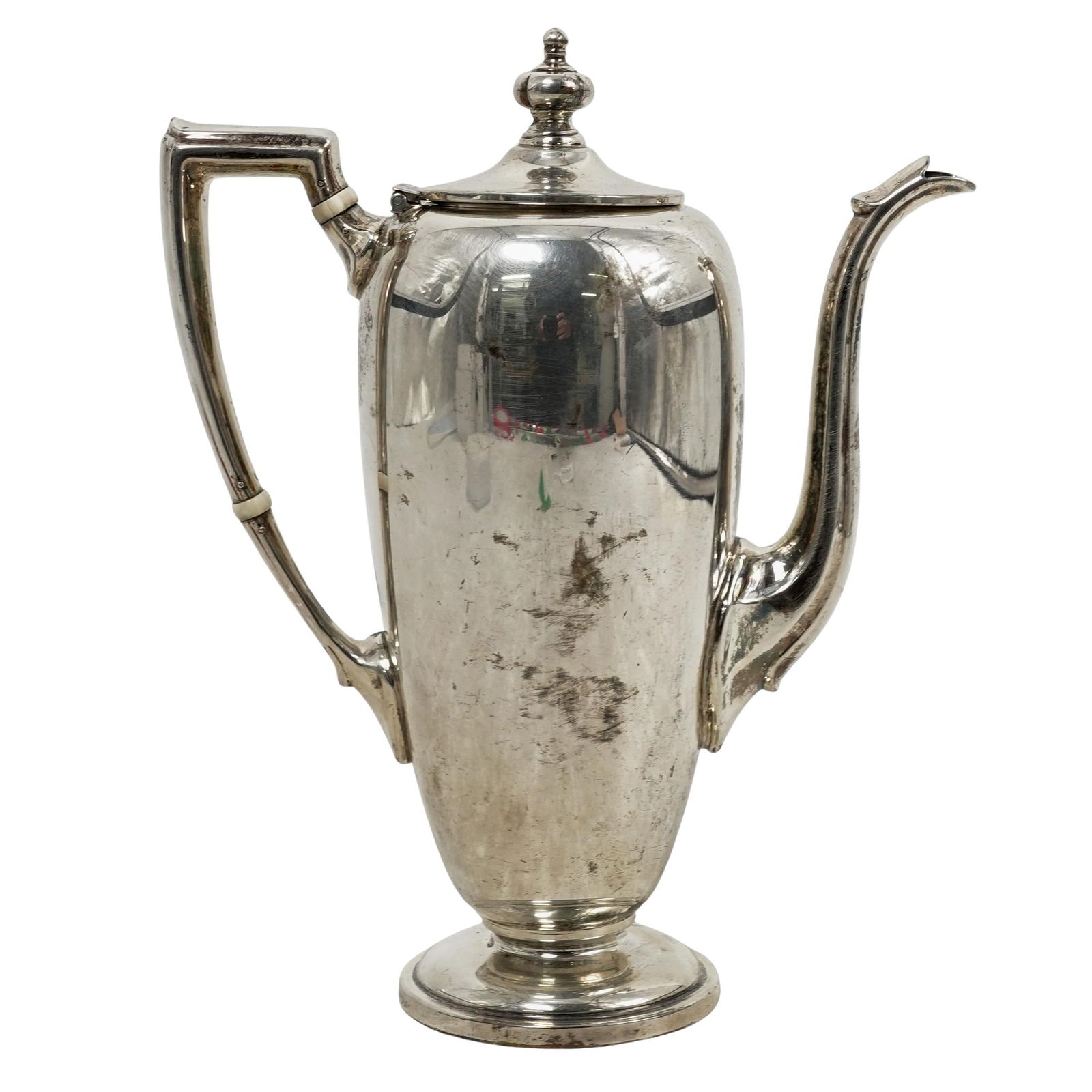 Reed & Barton Sterling Silver Coffee Pot: Reed & Barton Sterling Silver Coffee Pot 20th century, USA Sterling silver coffee pot with sleek, tapered body, pedestal base and hinged lid. Marked "Reed & Barton, Sterling , D 87 10" Weight: 598g.
