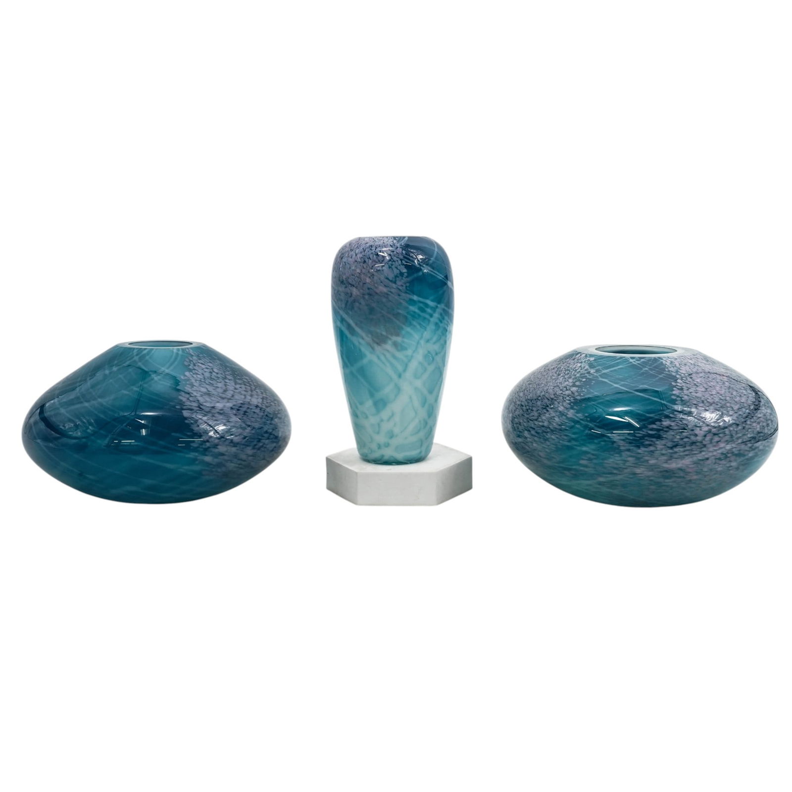 (3 Pc) Mathilda Brown Blue Art Glass Vases: (3 Pc) Mathilda Brown Blue Art Glass Vases1991, USAThe vases characterized by nature-inspired landscapes and botanical themes created thought process of layering powdered and flat glass. The water lik
