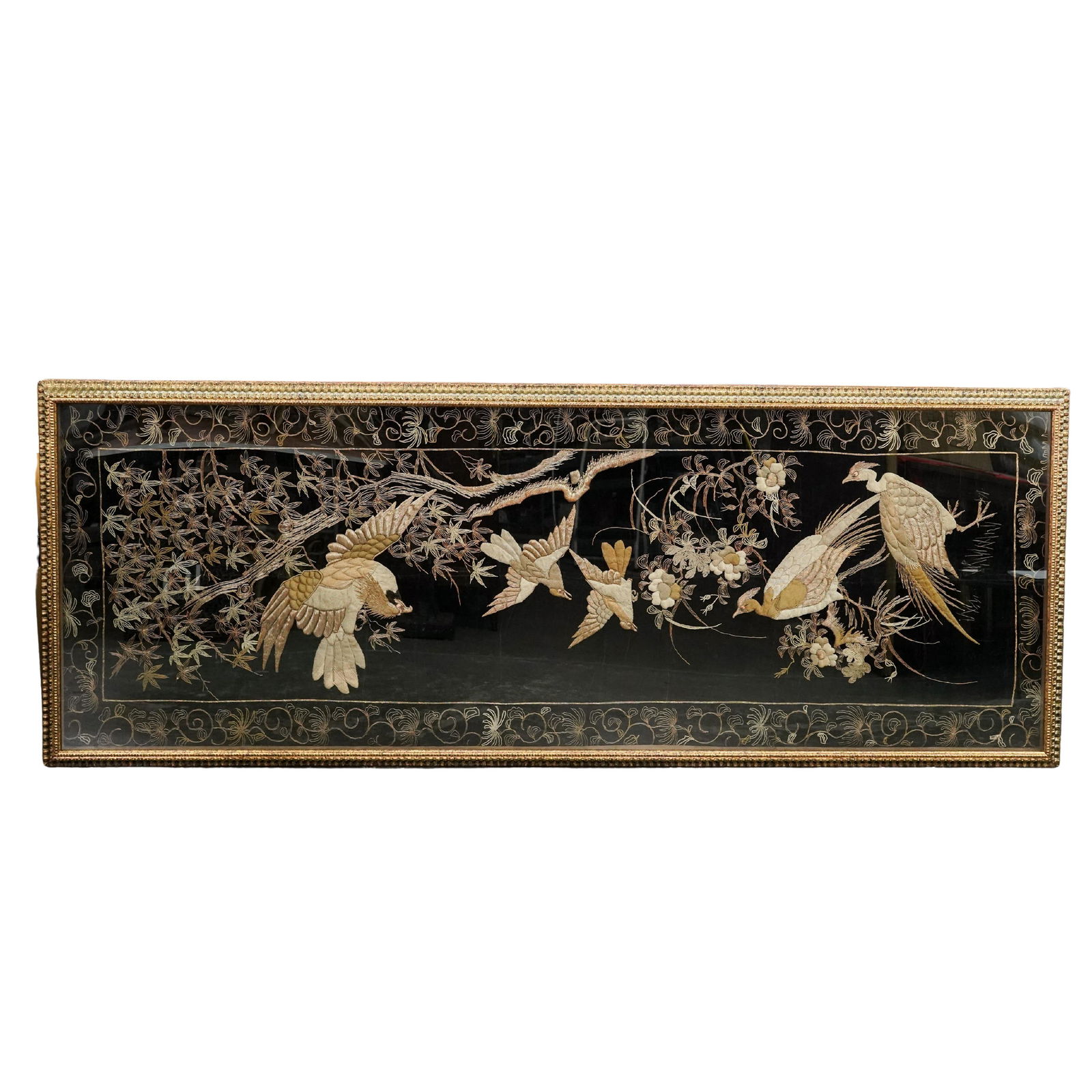 Large Japanese Meiji "Birds and Flowers" Scene Embroidered Tapestry: Large Japanese Meiji "Birds and Flowers" Scene Embroidered Tapestry Early 20th century, Japanese A large vintage Japanese embroidered tapestry featuring a "Birds and Flowers" or "Kacho-ga" scene