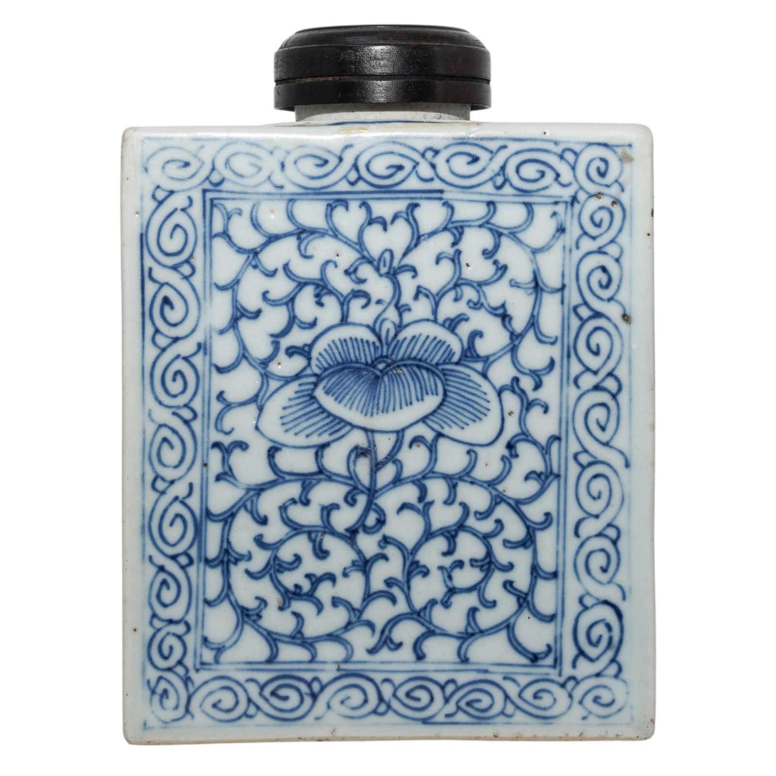 Antique Chinese Blue & White Porcelain Tea Caddy: Antique Chinese Blue & White Porcelain Tea CaddyEarly 20th century, ChineseAntique Chinese blue and white porcelain tea caddy with carved wooden lid. Decorated with intertwined floral motifs.H: 6 1/4"
