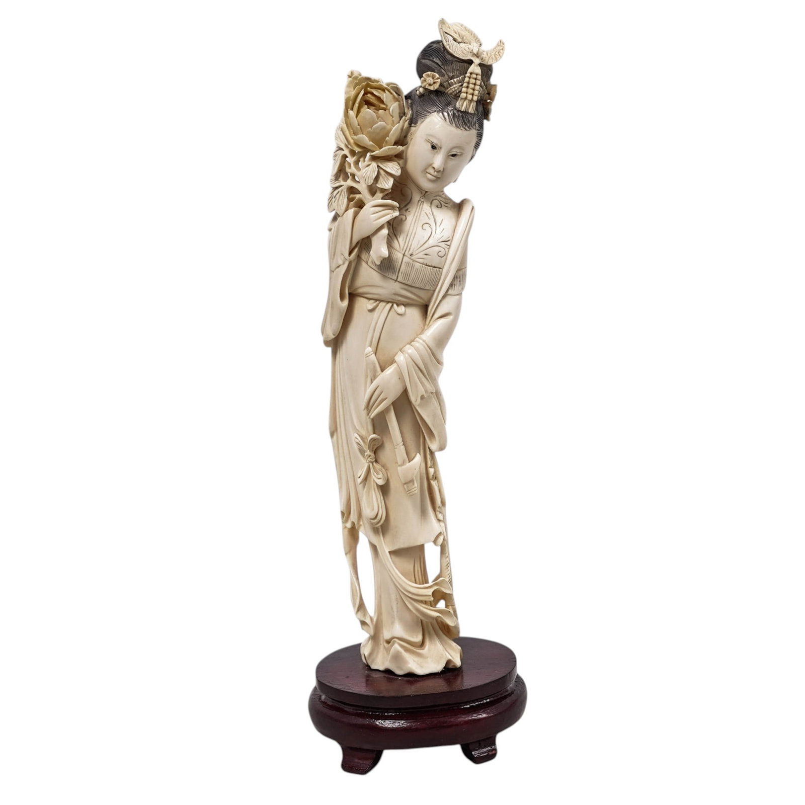 Japanese Carved Bone Geisha with Lotus: Japanese Carved Bone Geisha with LotusEarly to mid 20th century, JapaneseA Japanese carved bone Geisha figure holding a lotus flower. Affixed to wooden base.H 9.75" x W 2.125"Base H 1.375" x W 2.75" x