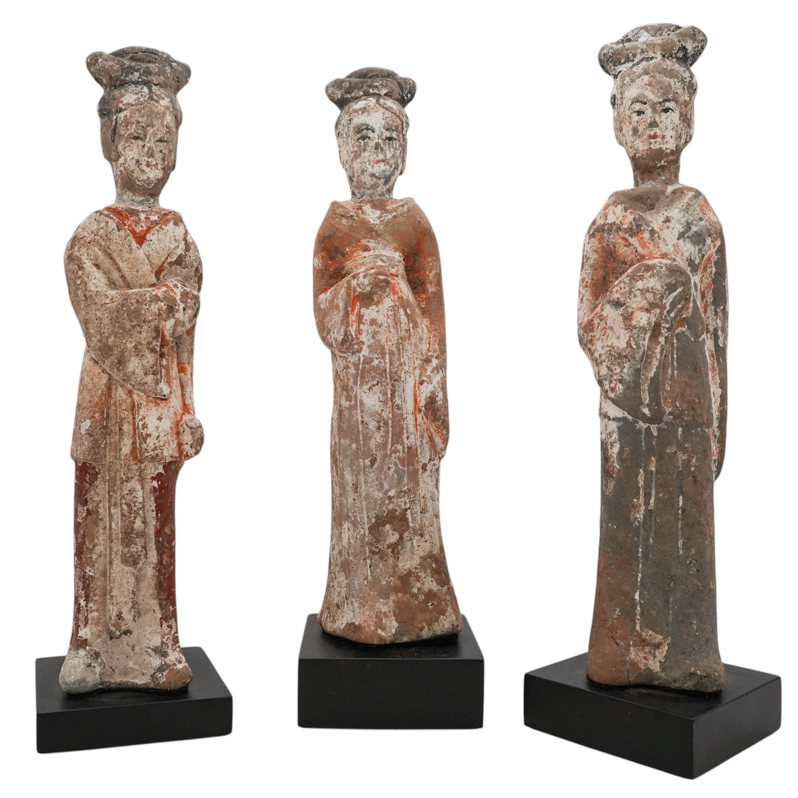(3 Pc) Chinese Tang Dynasty Pottery Female Tomb Attendants: (3 Pc) Chinese Tang Dynasty Pottery Female Tomb Attendants7th-9th century, ChineseThree terracotta mingqi tomb attendant figures representing court ladies, meant to accompany the deceased in the after