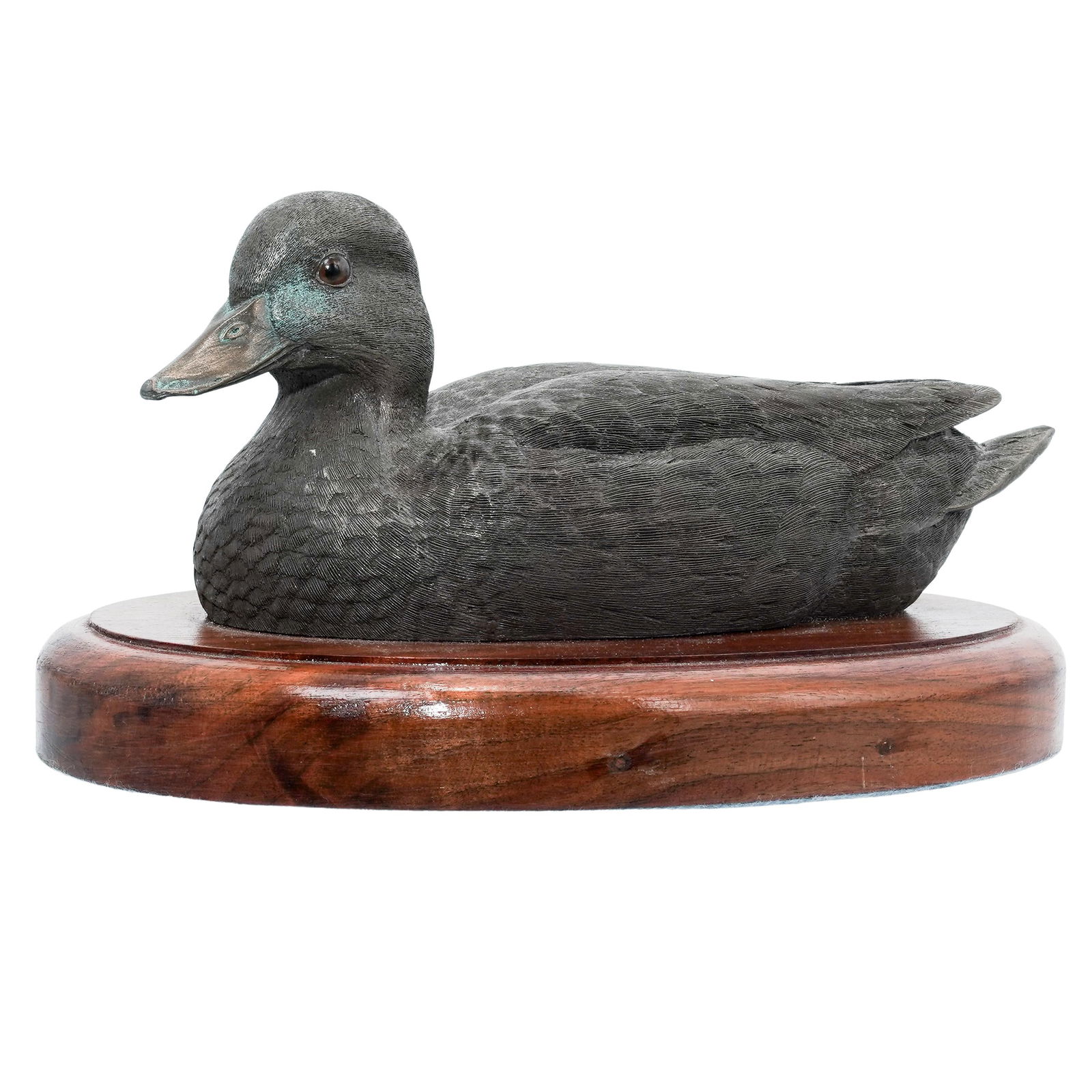 Vintage Bronze 'Duck' Sculpture On Wooden Base: Vintage Bronze 'Duck' Sculpture On Wooden Base 20th century, Continental Vintage bronze 'Duck' sculpture. Depicts a duck with carved feather details and on an oval wooden plinth base. H: 6" x W: 10"
