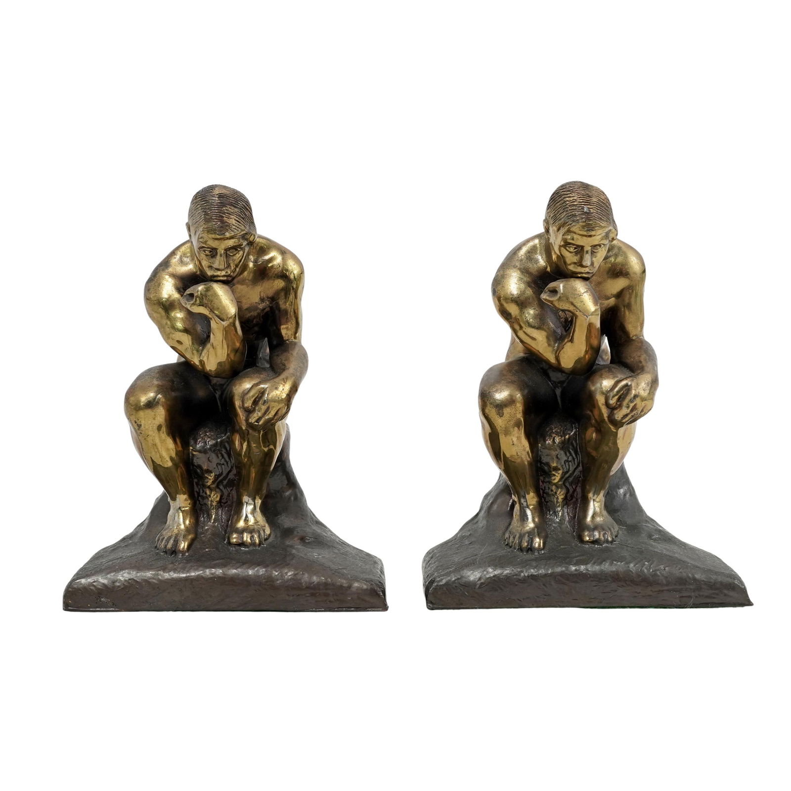 After Auguste Rodin "The Thinker" Pair Brass Bookends: After Auguste Rodin "The Thinker" Pair Brass Bookends 20th century, European These brass bookends are modeled after the iconic (1880-81) masterpiece by Rodin. They depict a man sitting in deep