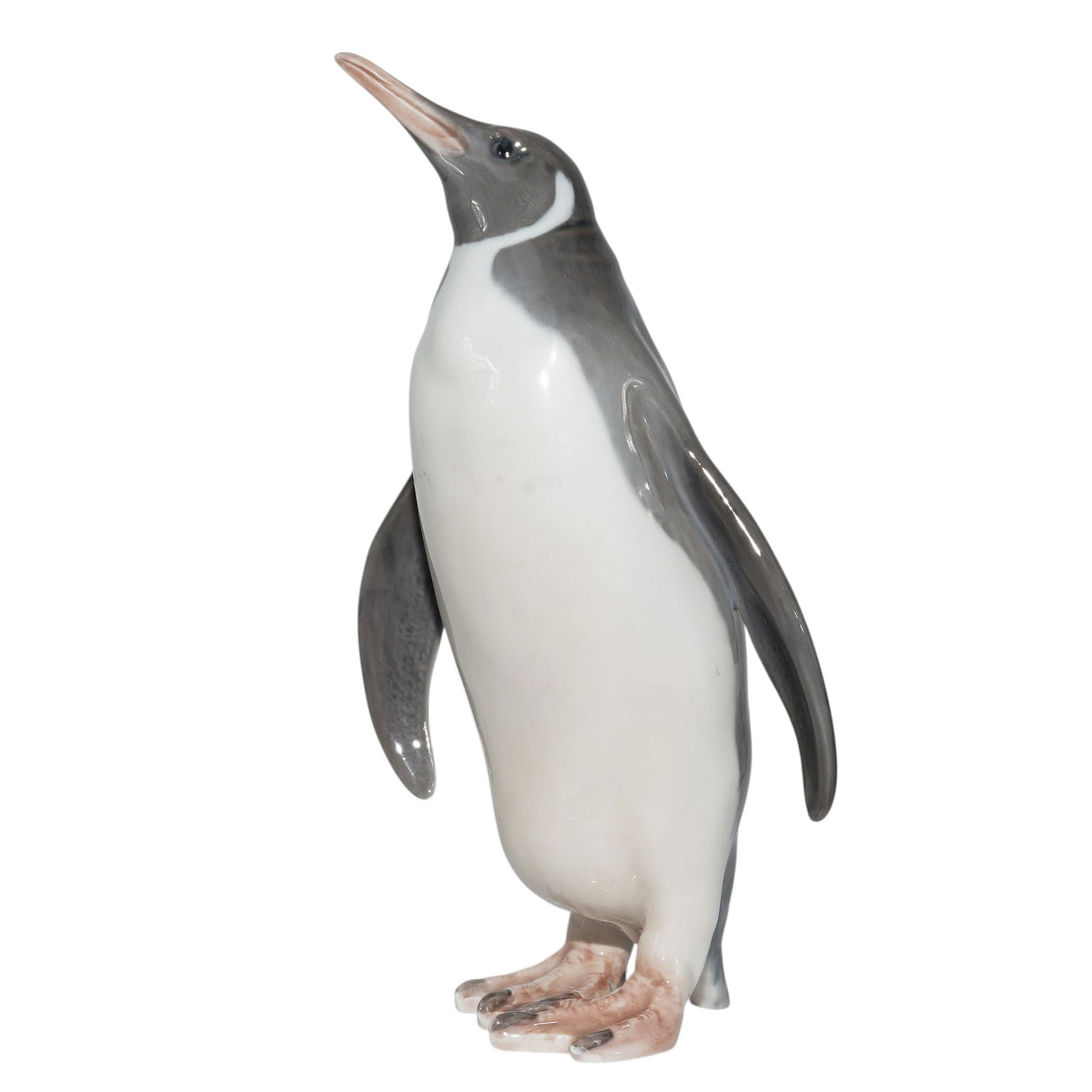 Royal Copenhagen Penguin Figurine: Royal Copenhagen Penguin Figurine Early 20th Century, Danish Royal Copenhagen glazed porcelain "Penguin" figurine designed by Theodor Madsen in 1902. Model #417. Retired Piece: 1902. Marked with