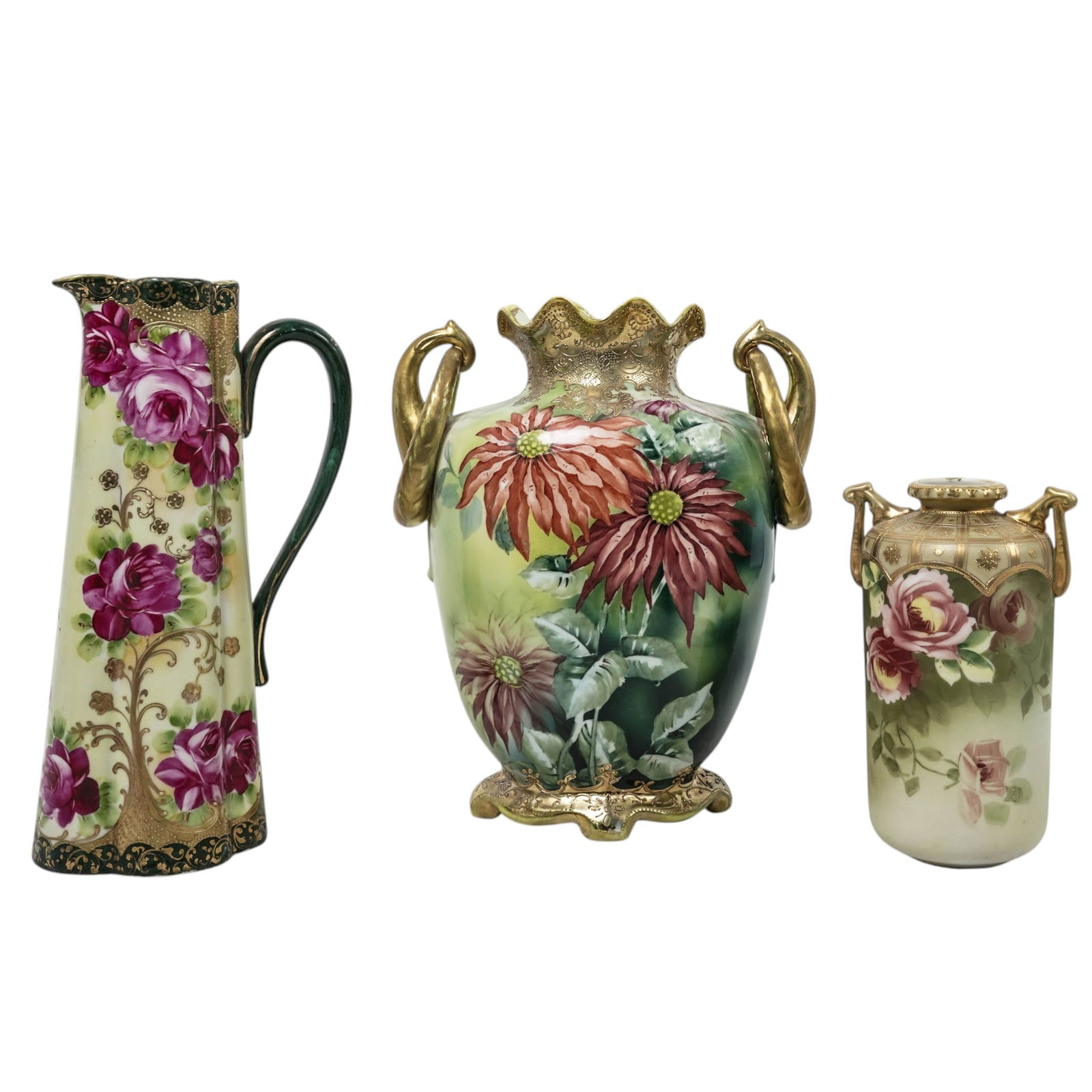 (3pc) Antique Japanese Nippon Floral Vases: (3pc) Antique Japanese Nippon Floral VasesLate 19th to early 20th Cent., JapaneseThis collection consists of three hand-painted porcelain pieces featuring polychrome floral imagery on a light yellow g