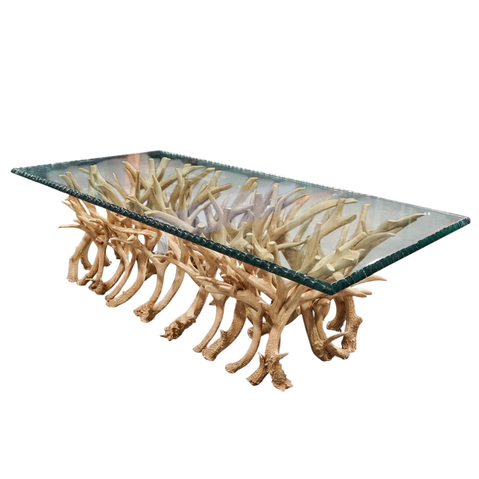 Faux Antler Base Glass Top Coffee Table: Faux Antler Base Glass Top Coffee Table 20th Cent., USA A faux-antler table base with a rectangular glass top. Base H 17" x L 53" x W 24.25"
