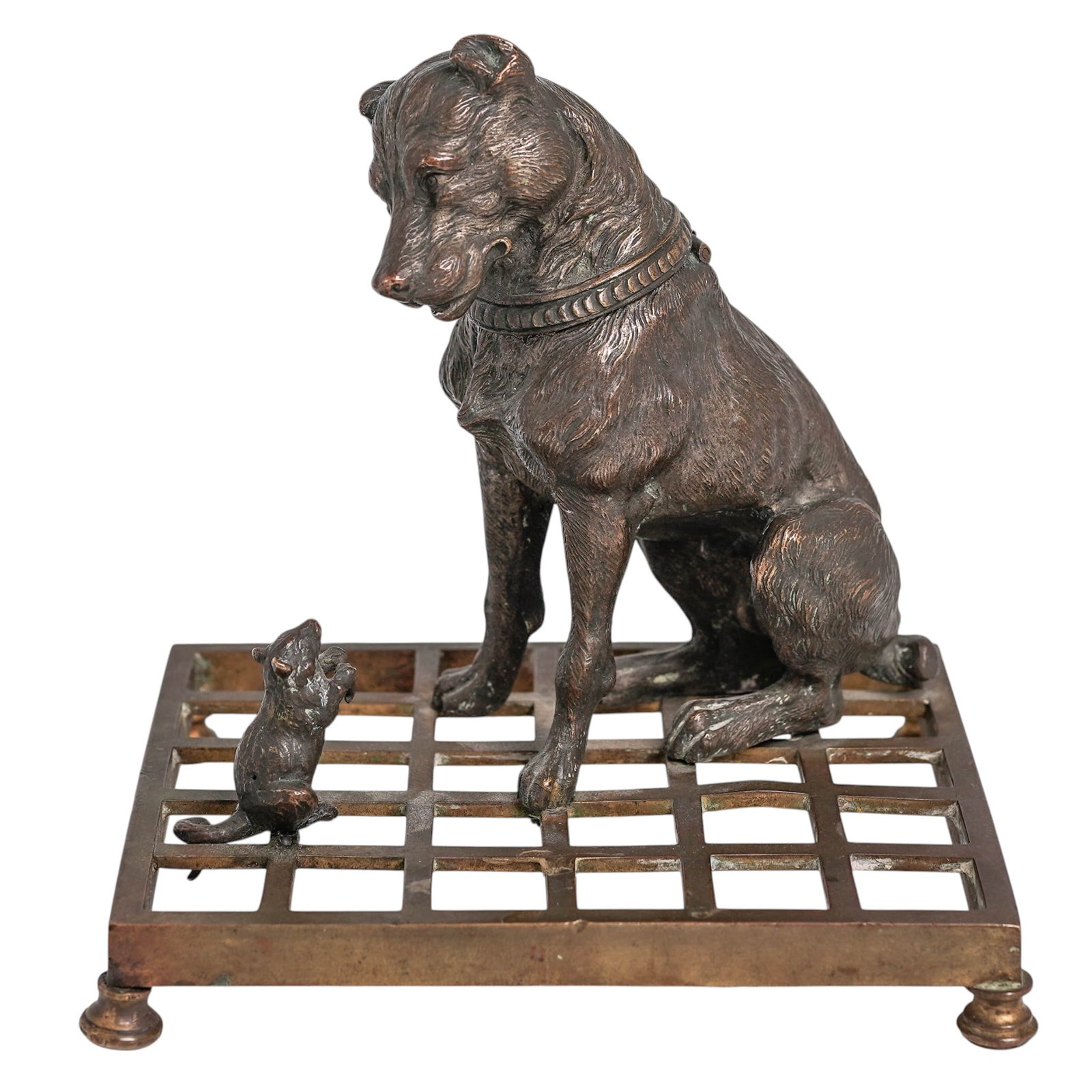 Antique Bronze Dog & Mouse Inkwell: Antique Bronze Dog & Mouse InkwellEarly 20th century, EuropeanThe inkwell features a dog and a mouse on a distinctive open-grate base. The rectangular grid base supported by four small ball-shaped fee