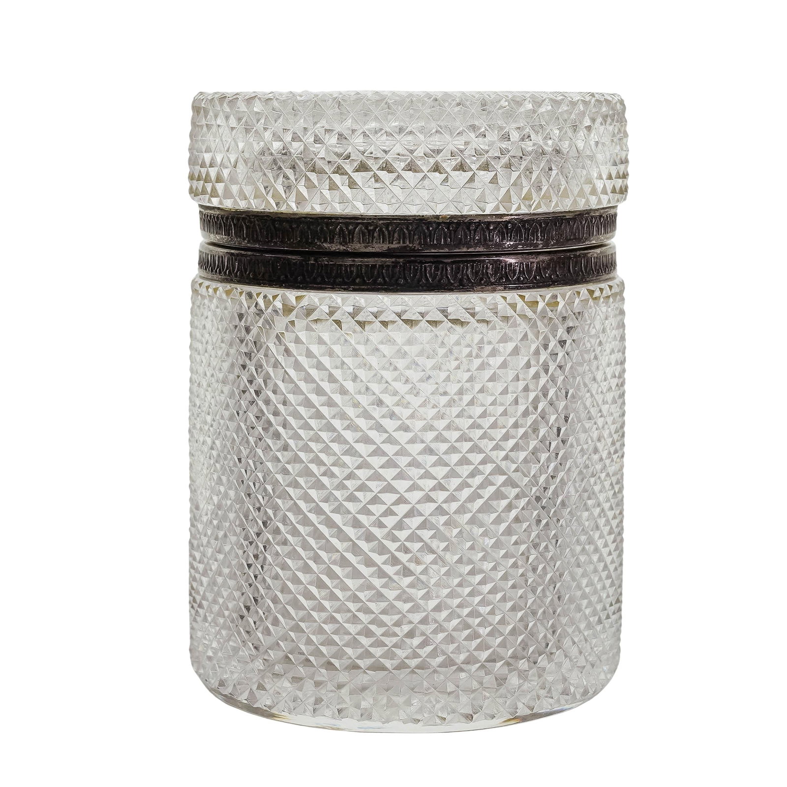 Cartier Silver Mounted Cut Crystal Jar: Cartier Silver Mounted Cut Crystal JarEarly to Mid 20th. FrenchThis Cartier cut crystal jar features a classic, all-over diamond-cut pattern that brilliantly catches the light. The cylindrical body is