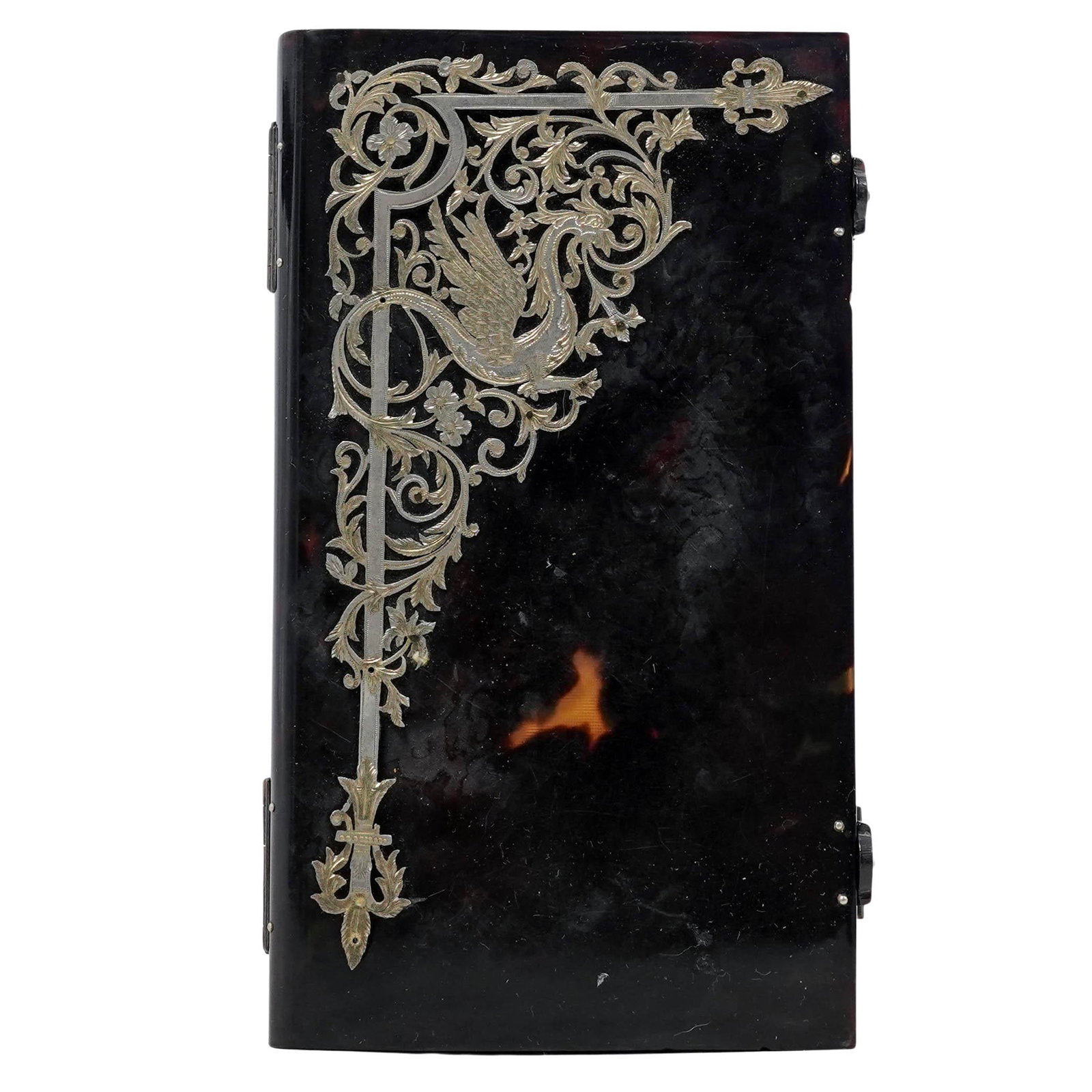 Napoleon III Era Tortoise Hued Bible with Silver Overlay: Napoleon III Era Tortoise Hued Bible with Silver Overlay19th century, EuropeanThe bible's top left corner is decorated with an intricate, reticulated silver overlay. The design is in the Boulle style,