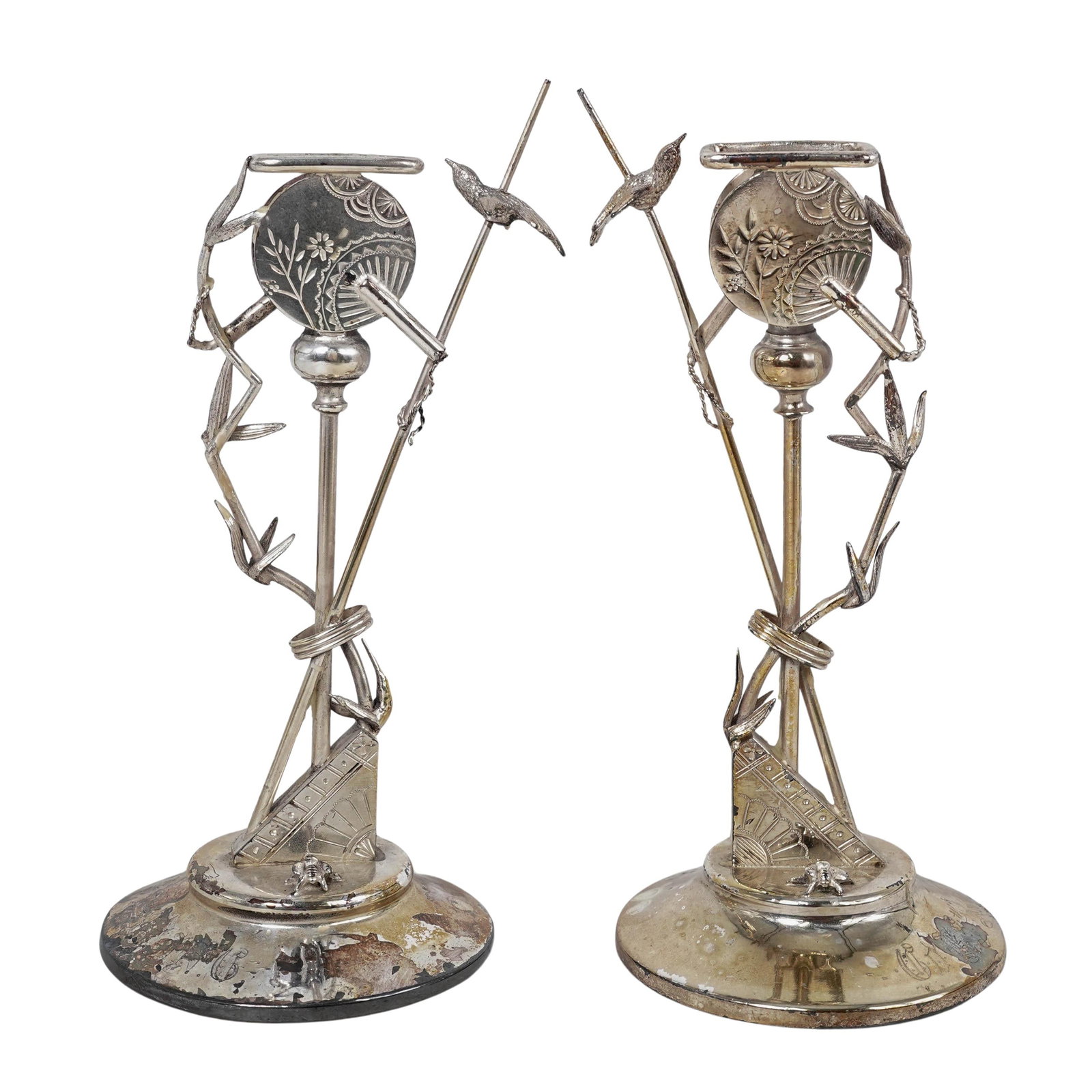 Pair Rogers, Smith & Co. Art-Nouveau Ornate Silver Plated Candle Holders: Pair Rogers, Smith & Co. Art-Nouveau Ornate Silver Plated Candle HoldersC. 1869-1898, USAEach piece depicts a bird perched on a vine-like stalk. The stalks are intricately twisted and include delicate
