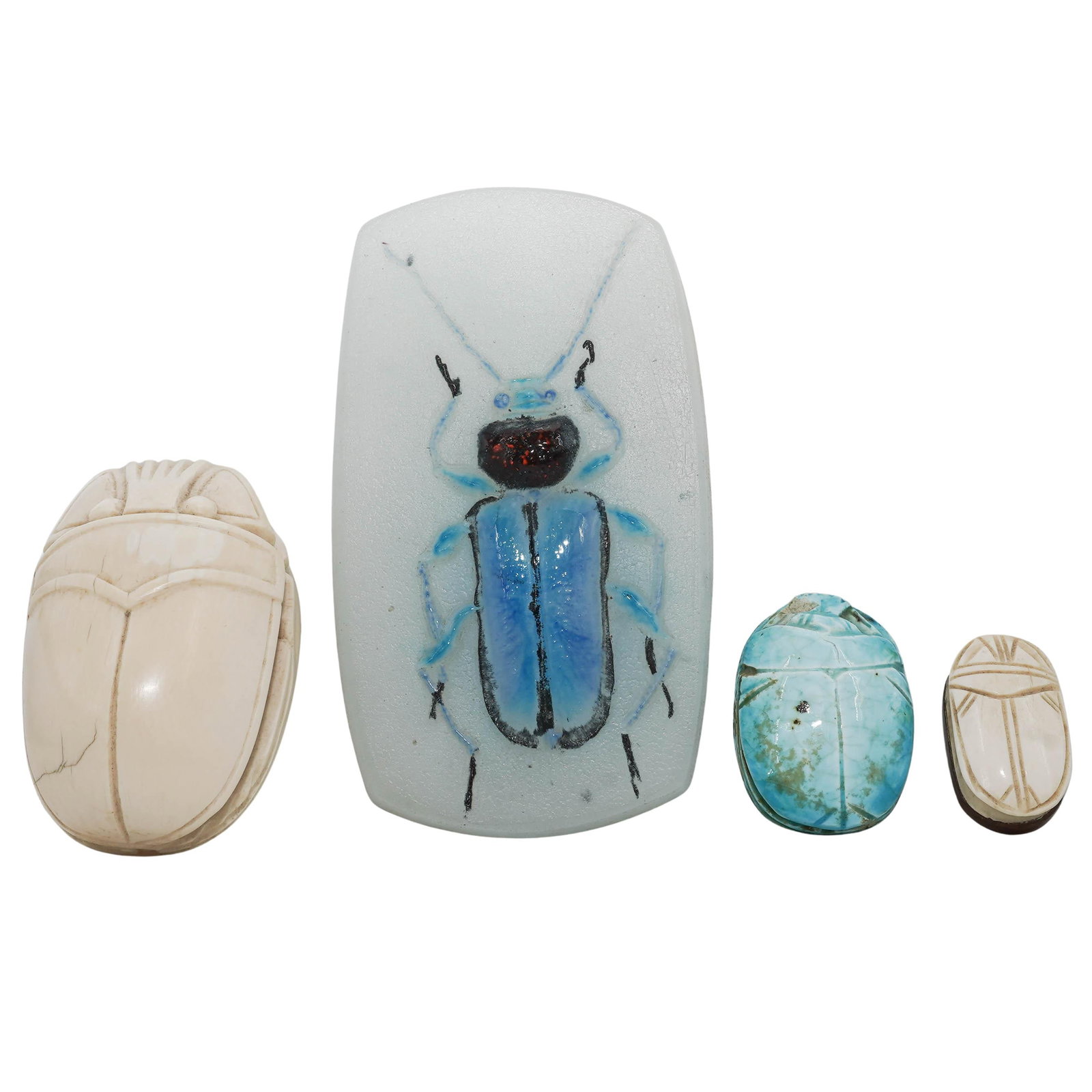 (4pc) Vintage Carved Stone Bone & Crystal Scarabs Figures: (4pc) Vintage Carved Stone Bone & Crystal Scarabs FiguresMid 20th Cent. EgyptianVintage carved stone, bone and crystal scarabs figures. The lot includes:(1) Carved crystal features a stylized beetle d