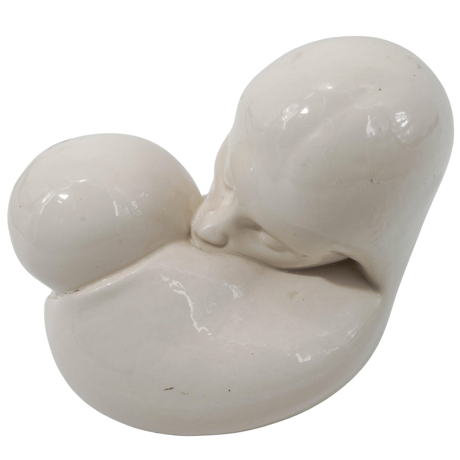 Ceramic Sculpture Of A "Mother and Child": Ceramic Sculpture Of A "Mother and Child" Late 20th Century, USA. A striking modern ceramic sculpture featuring a fluid, biomorphic form of a woman kissing her child rendered in a high-gloss white