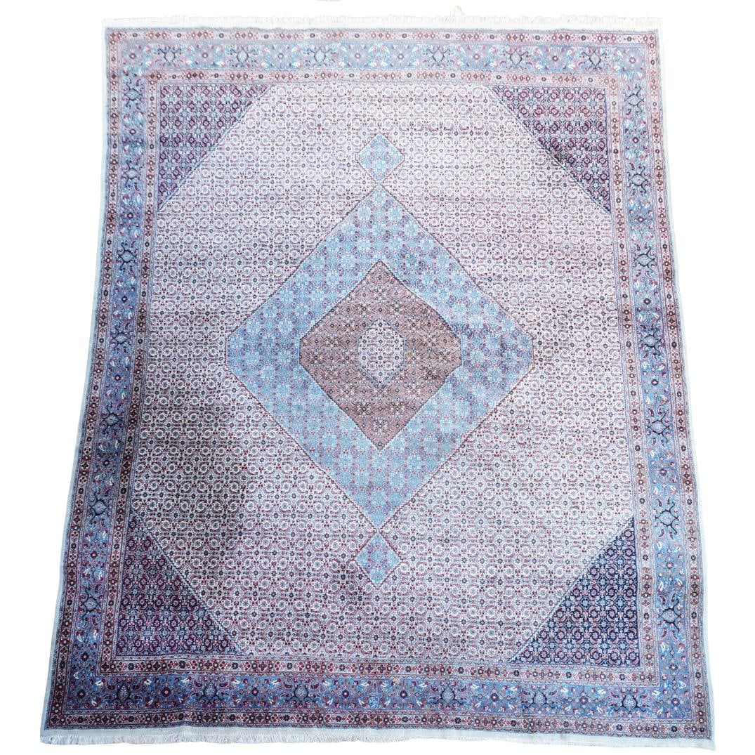 Persian Tabriz Mahi Wool Rug: Persian Tabriz Mahi Wool Rug 20th Century, Persia Persian Tabriz Mahi wool pile rug, featuring Herati design throughout the field. Primarily in navy blue, rust red, and cream. Cream colored fringe at