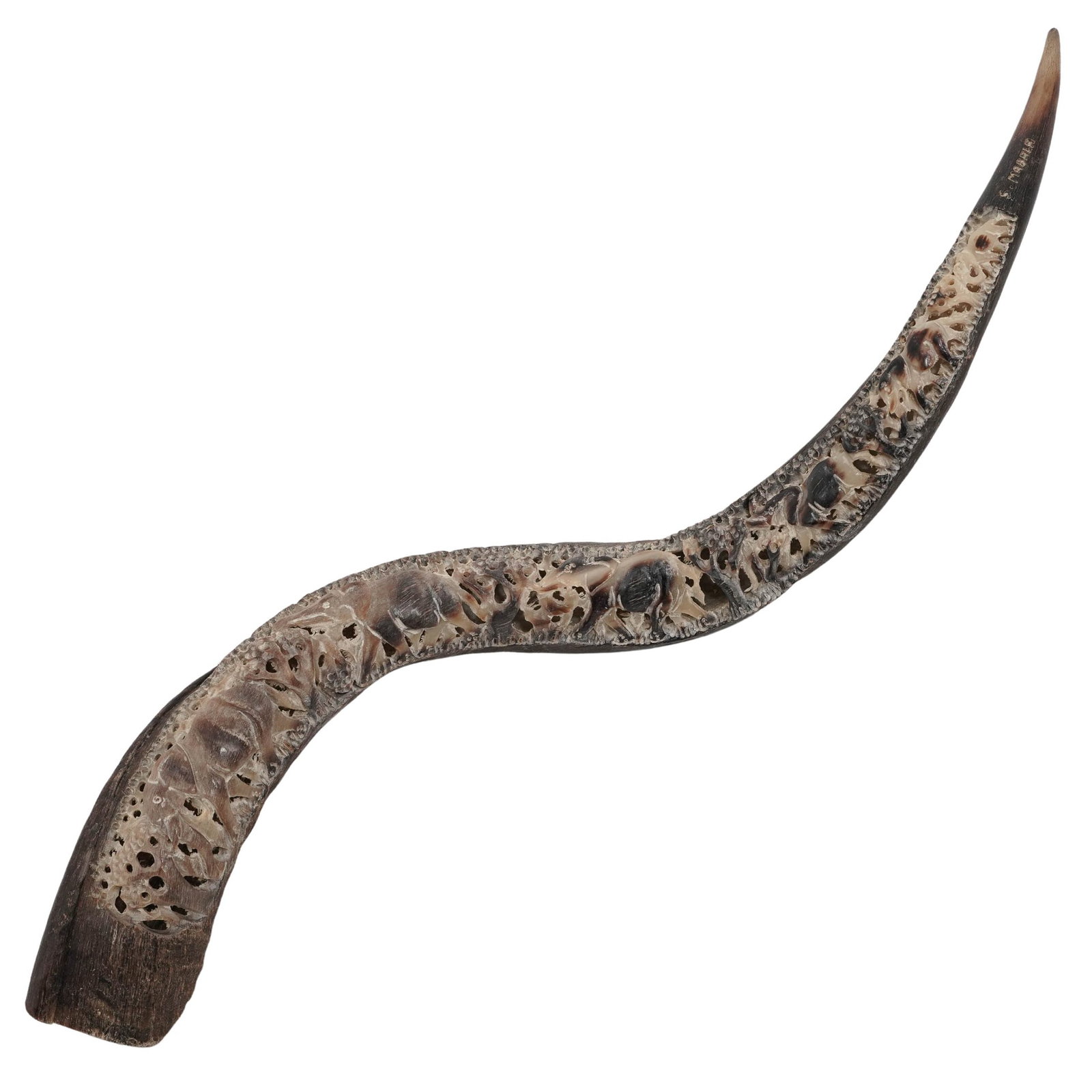 African S. Mabala Hand Carved Kudu Horn: African S. Mabala Hand Carved Kudu Horn 20th Cent.,African This 20th-century hand-carved Kudu horn is fashioned from the spiral horn of a Greater Kudu antelope. It features the signature of "S.