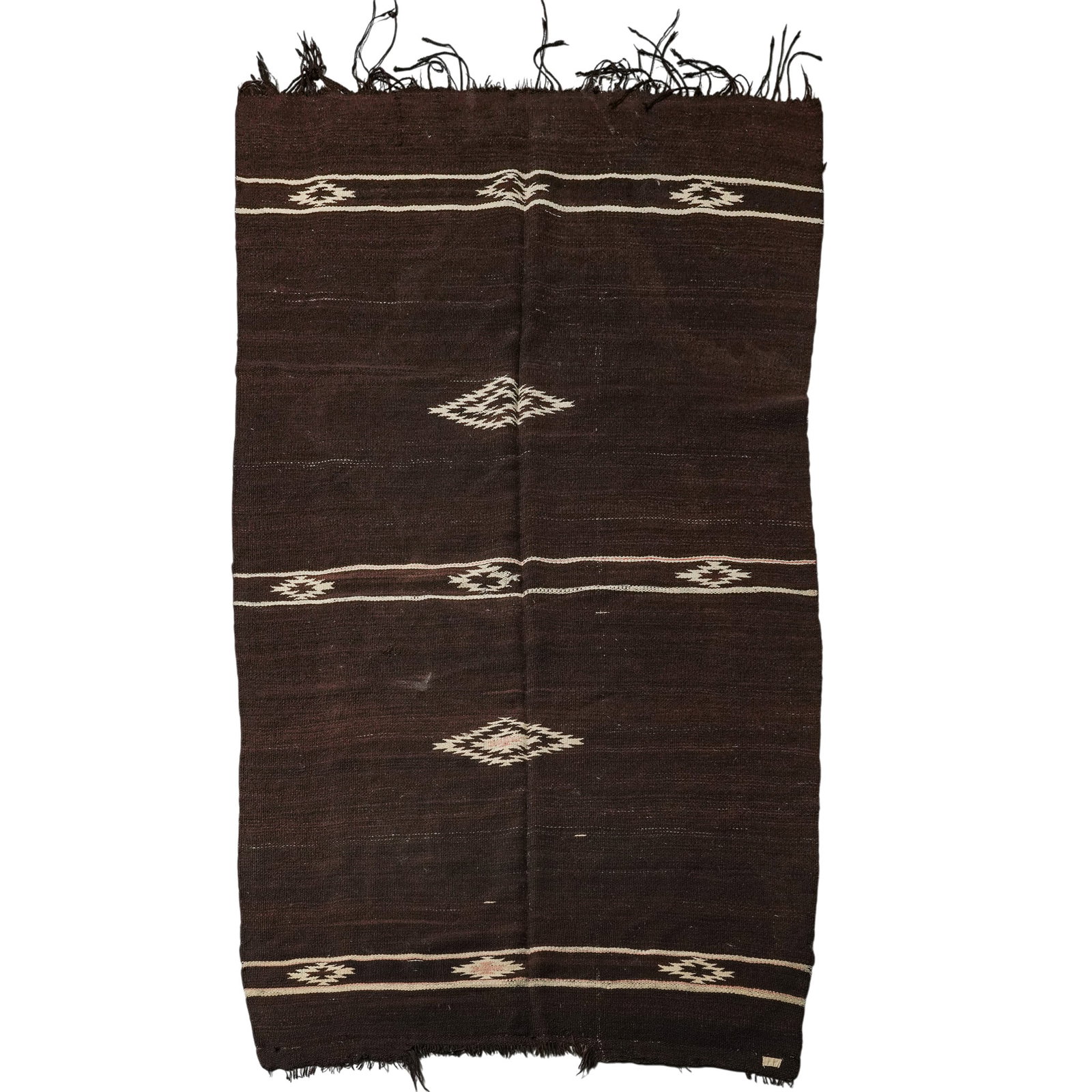 Vintage Western Textile: Vintage Western Textile 20th Century, USA Rectangular handwoven wool textile featuring a rich brown field accented with cream geometric motifs and striped borders. Finished with fringe along the