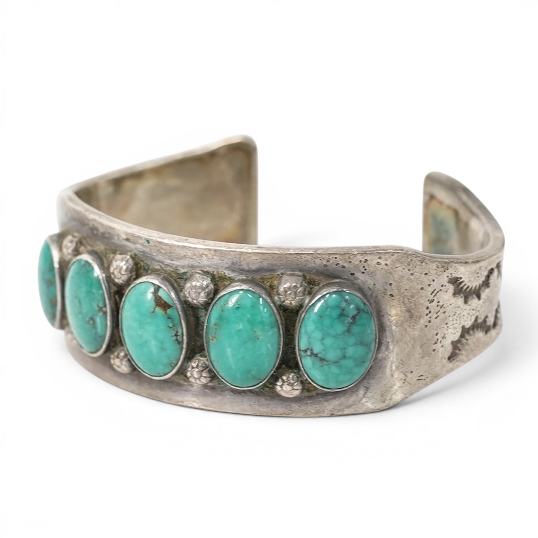 Vintage Navajo Sterling Silver & Turquoise Cuff Bracelet, Signed: Vintage Navajo Sterling Silver & Turquoise Cuff Bracelet, Signed 1970s-1980s, USA Heavy gauge Navajo sterling silver cuff bracelet set with five oval turquoise cabochons in bezel settings with
