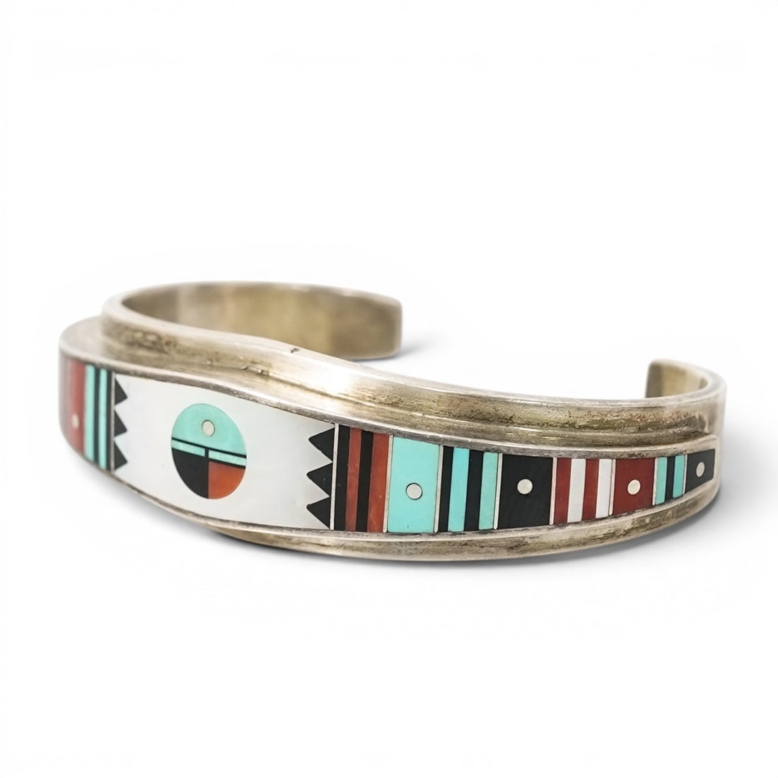 Vintage E. Benally Navajo Sterling Silver & Multi-Stone Inlay Cuff Bracelet: Vintage E. Benally Navajo Sterling Silver & Multi-Stone Inlay Cuff Bracelet 1970s-1980s, USA Vintage Navajo sterling silver cuff bracelet by E. Benally with channel inlay panels of turquoise, coral,