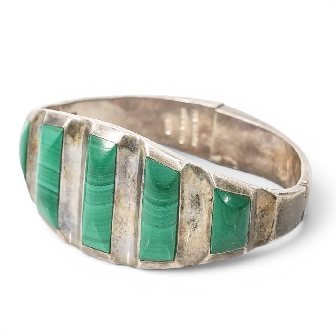 Mexican Sterling Silver & Malachite Hinged Bracelet: Mexican Sterling Silver & Malachite Hinged Bracelet Late 20th century, Mexico Mexican sterling silver bracelet set with rectangular malachite panels across a wide ribbed silver form with hinged bracel