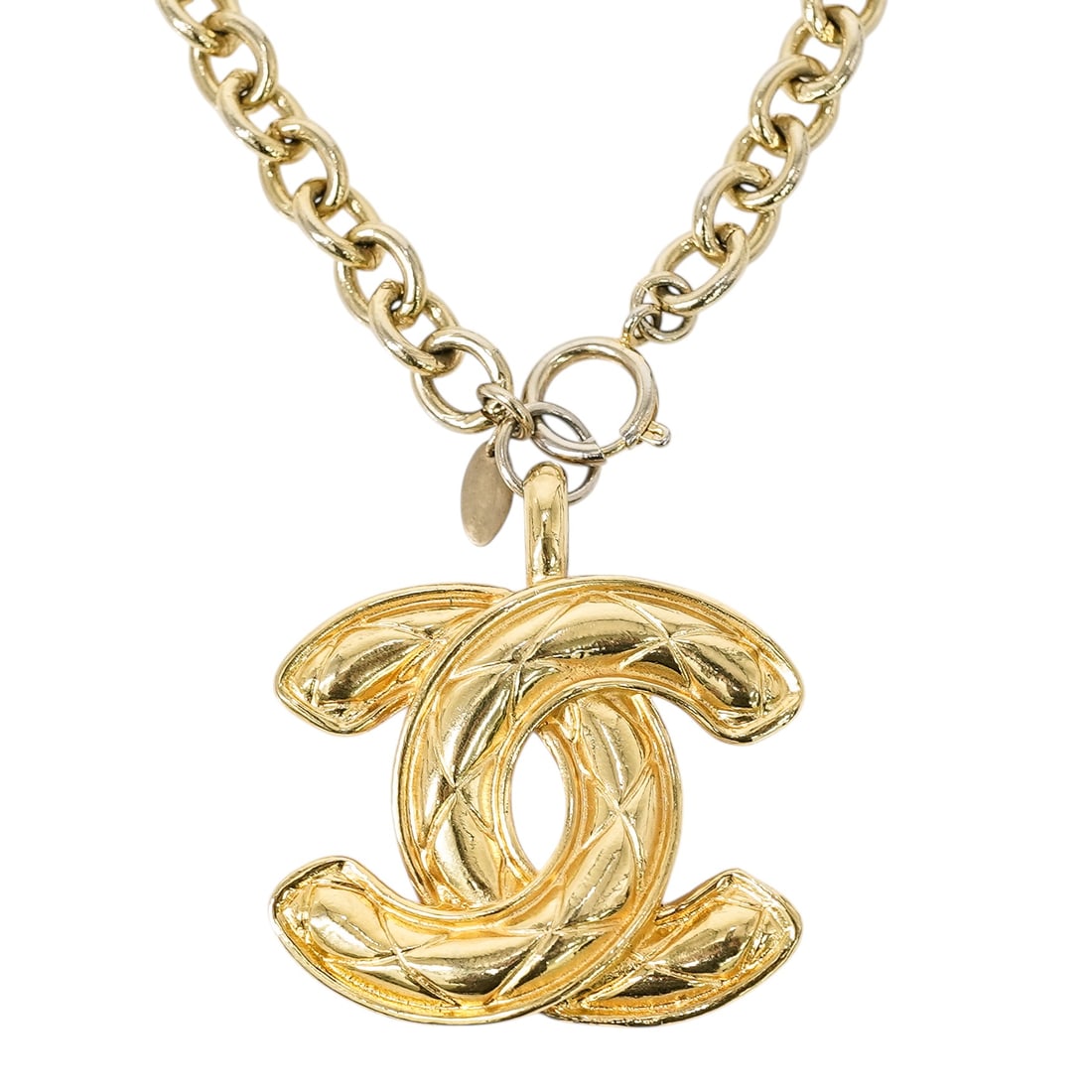 Chanel Gold-Tone Quilted CC Large Pendant Chain Belt: Chanel Gold-Tone Quilted CC Large Pendant Chain Belt 1980s, French Chanel gold-tone chain belt featuring a large interlocking CC logo plaque with raised quilted/textured detailing and double