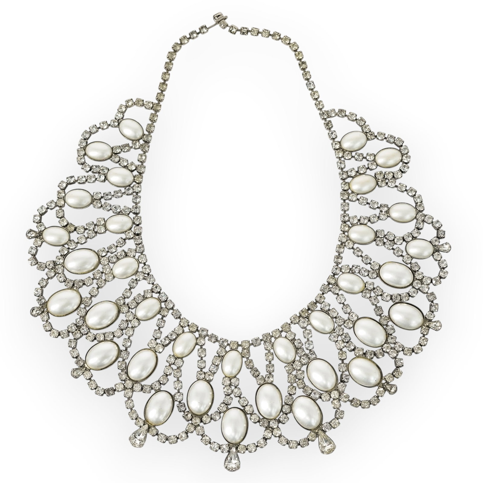 Vintage Juliana Pearl and Rhinestone Bib Necklace: Vintage Juliana Pearl and Rhinestone Bib Necklace 1950s, USA Vintage Juliana bib necklace featuring oval faux pearls set within a dramatic scalloped arrangement of clear rhinestones. Designed in