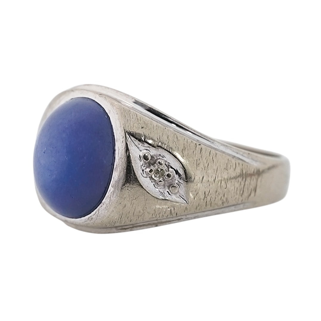 Vintage 14k Gold Diamond & Star Sapphire Ring: Vintage 14k Gold Diamond & Star Sapphire Ring Mid-20th Century, USA Vintage 14k white gold signet-style ring featuring an oval cabochon blue star sapphire, approx. 4.00 ctw, measuring approx. 8 x 12