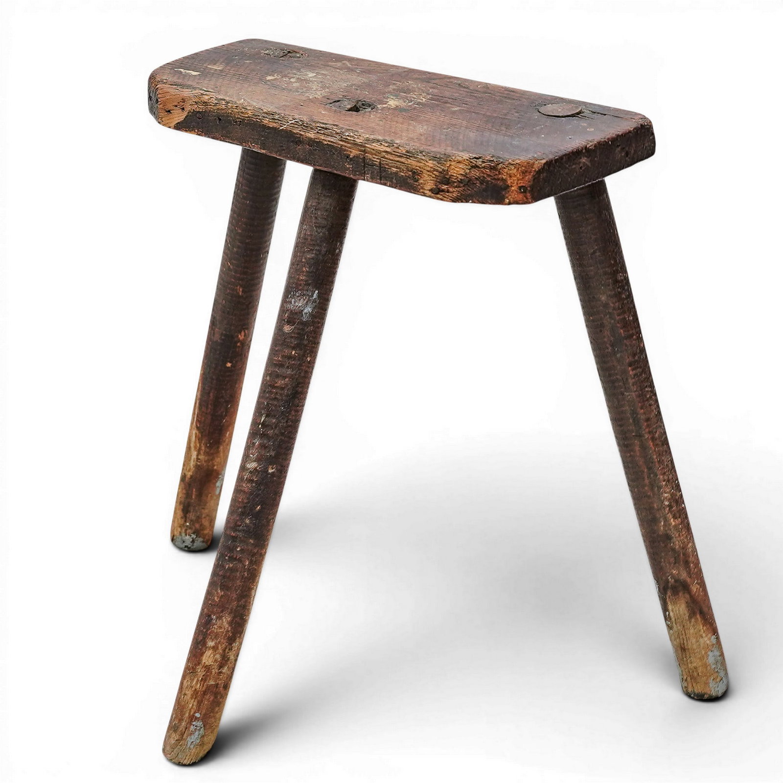 19th Cent. Primitive Cutlers Stool: 19th Cent. Primitive Cutlers Stool 19th Cent. A 19th century primitive cutler’s stool, of simple and utilitarian form, featuring a thick rectangular plank seat with rounded ends. H: 19.5" W: 16"