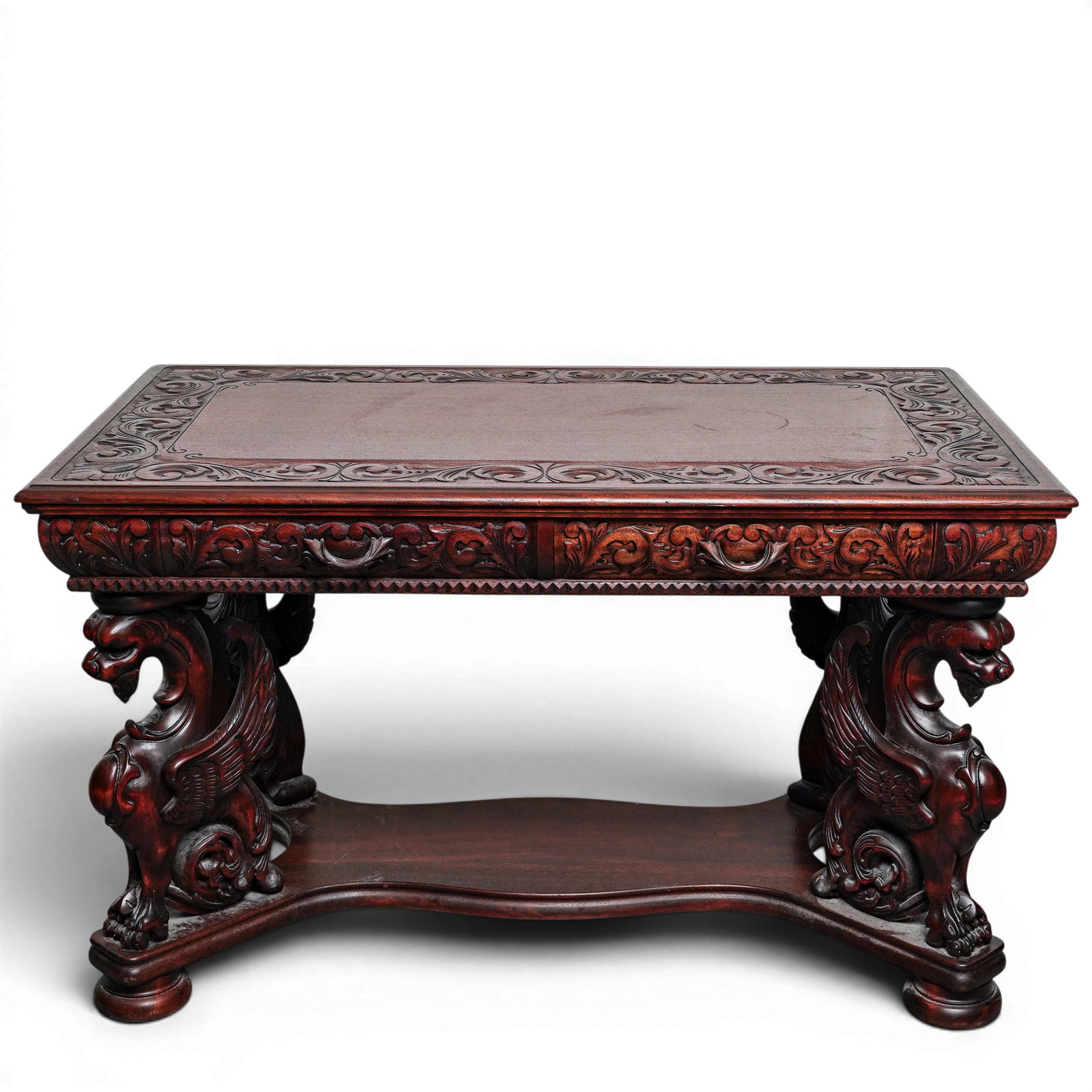 RJ Horner Style Carved Wood Griffin Writing Table: RJ Horner Style Carved Wood Griffin Writing Table Late 19th century Late 19th century Renaissance Revival carved mahogany winged griffin writing desk, highly celebrated and in the style of prominent N