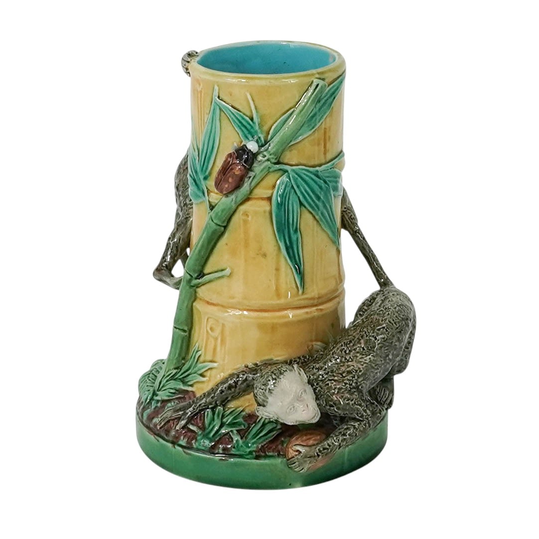Victorian Staffordshire George Jones "Monkeys and Bamboo" Majolica: Victorian Staffordshire George Jones "Monkeys and Bamboo" Majolica 19th Cent., English This Victorian George Jones Majolica spill vase features a cylindrical ochre body molded as tiered bamboo stalks