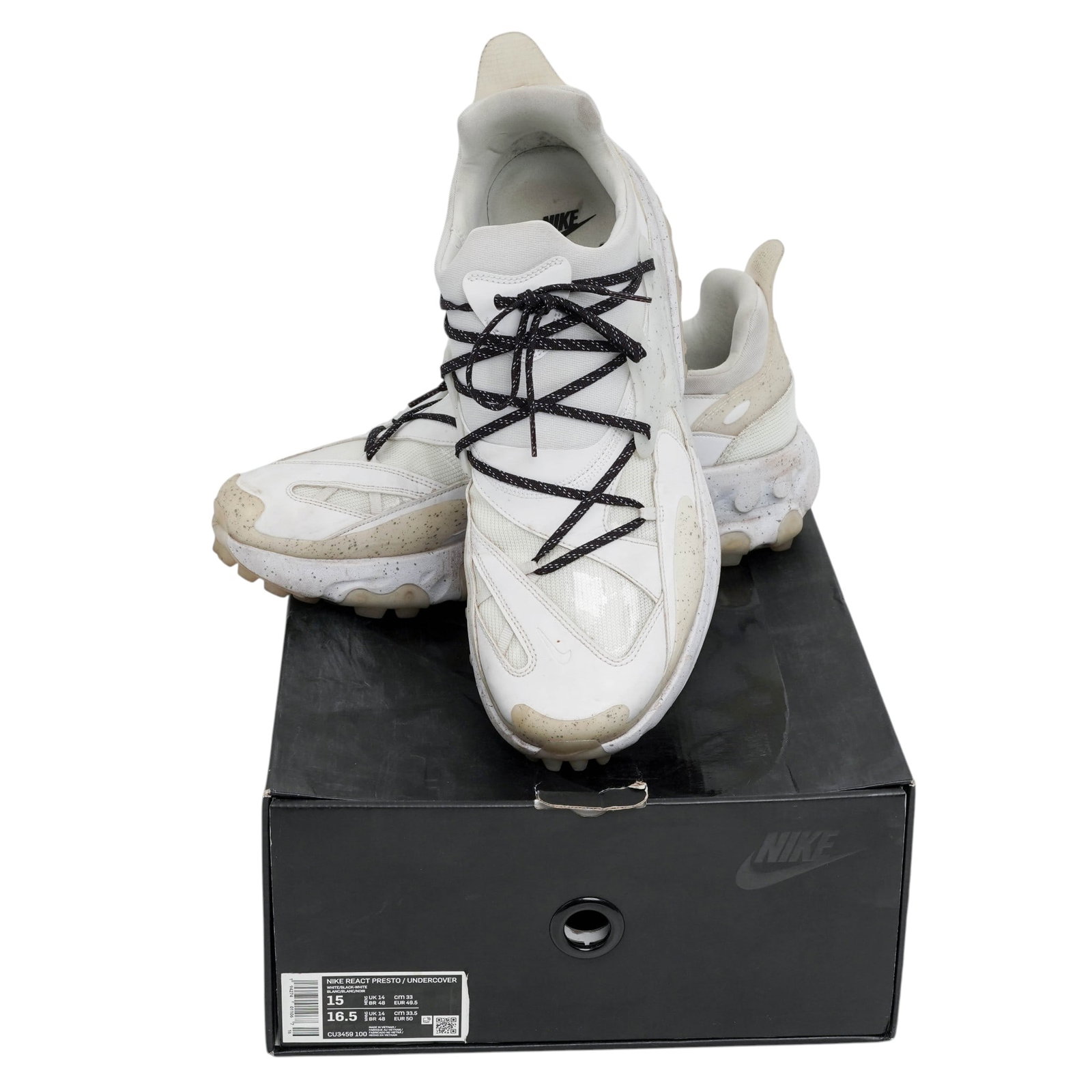 Nike x Jun Takahashi UNDERCOVER React Presto LE Sneakers: Nike x Jun Takahashi UNDERCOVER React Presto LE Sneakers 2020, USA Nike x Jun Takahashi UNDERCOVER React Presto Sneakers; pair of collaborative Nike and UNDERCOVER sneakers in white tonal colorway wit