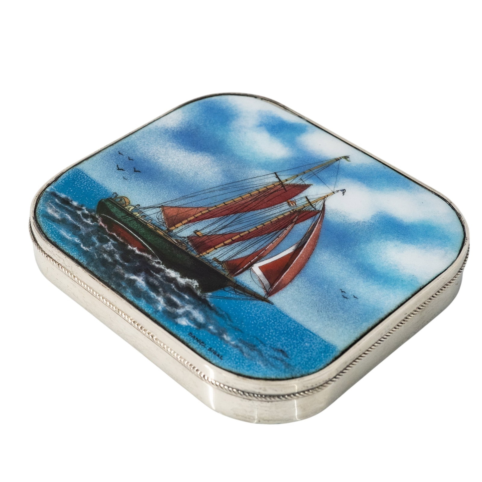 Daniel Sigal Sterling Silver & Enamel Box: Daniel Sigal Sterling Silver & Enamel Box 20th c., Italy Sterling silver box featuring a hand-painted enamel scene of a sailing ship on its hinged lid. The illustration is signed "Daniel Sigal" in the