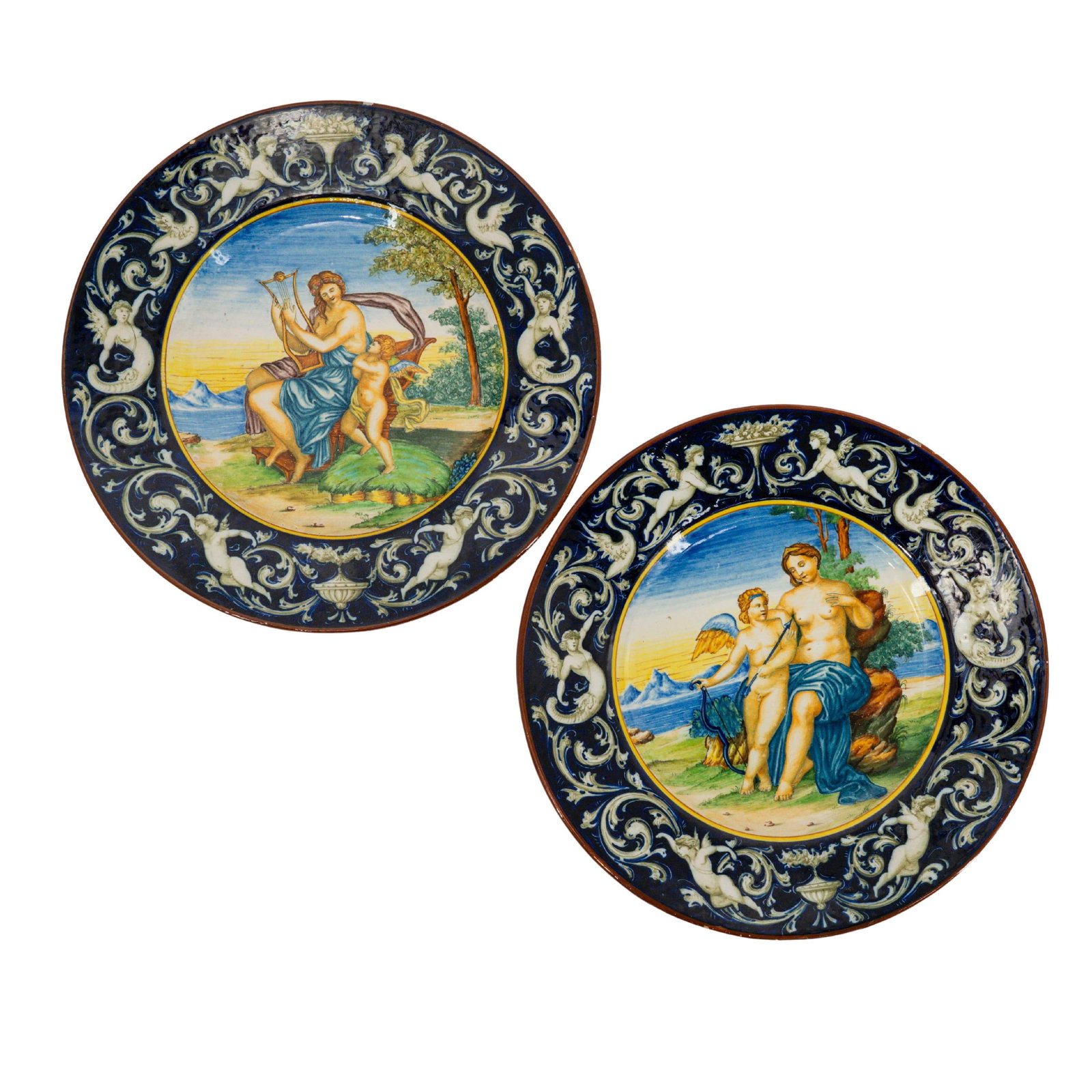 Pair Of Antique Italian Molaroni Pesaro Majolica Charger: Pair Of Antique Italian Molaroni Pesaro Majolica Charger Late 19th to early 20 Cent., Italian This pair of 19th-century Italian majolica chargers by Molaroni Pesaro features matching Raphaelesque grot
