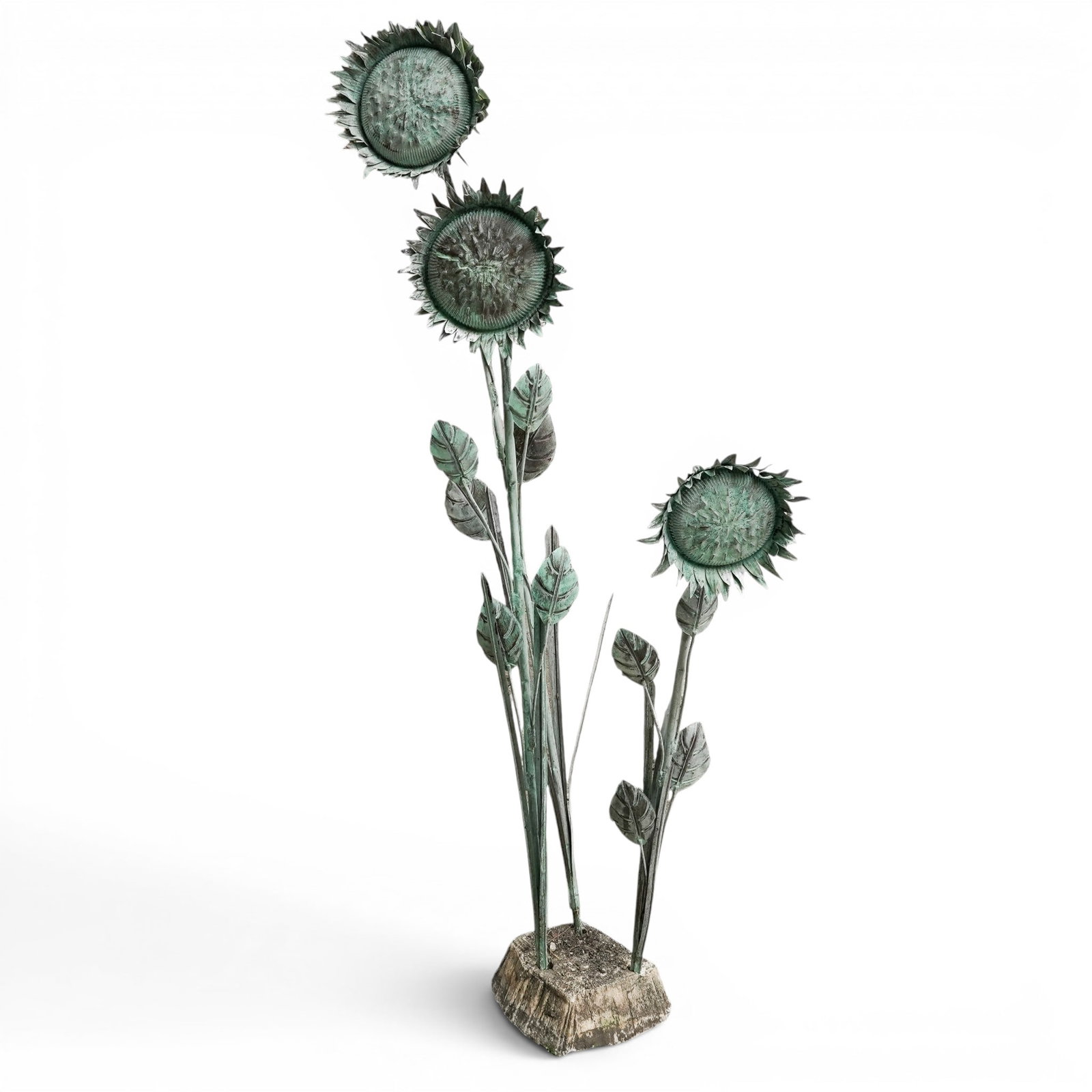 Vintage Copper Sunflowers Garden Sculpture: Vintage Copper Sunflowers Garden Sculpture 20th century The design features three stalks of highly detailed sunflowers at varying heights rising from a rugged, stone-like block base. It sports a disti
