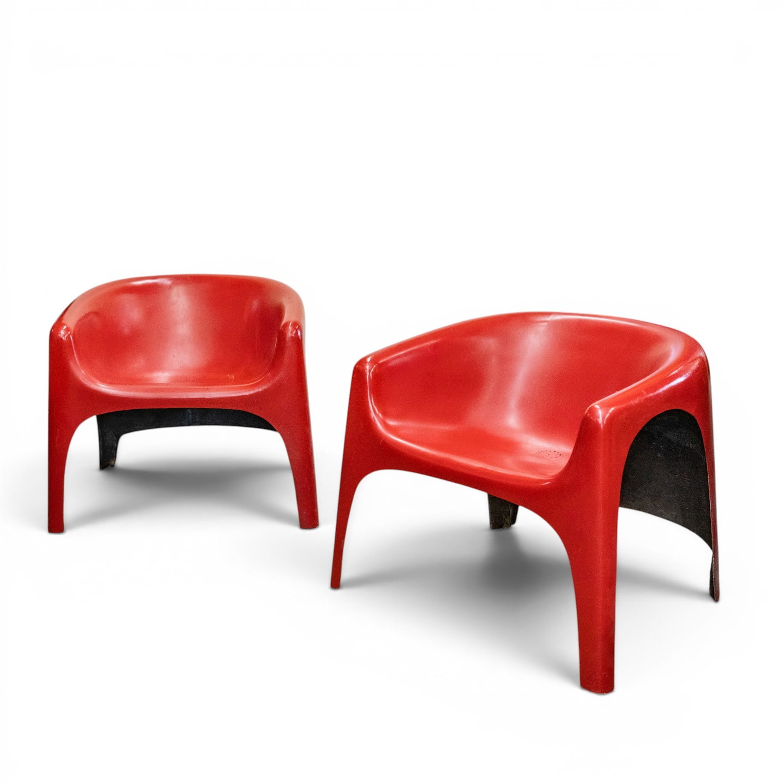 Pair of MCM Red Fiberglass Armchairs: Pair of MCM Red Fiberglass Armchairs Mid 20th century A pair of mid century modern red fiberglass armchairs. H 25" x W 26' x Depth approx. 25" x Seat H 15.75" x Seat depth 14"