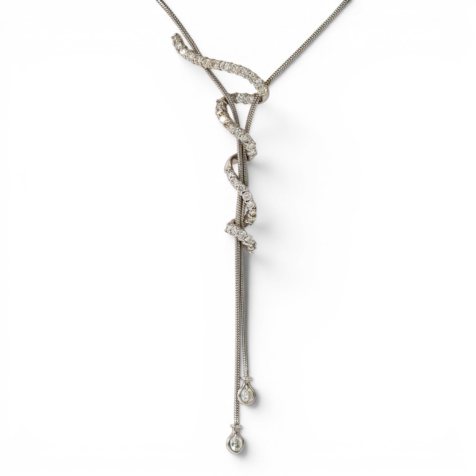 Jose Hess 18k Gold & Diamond "Squiggle" Necklace: Jose Hess 18k Gold & Diamond "Squiggle" Necklace 2000s, USA 18k white gold flexible snake-form lariat necklace from the Squiggle Collection featuring sinuous articulated strands set with approximately