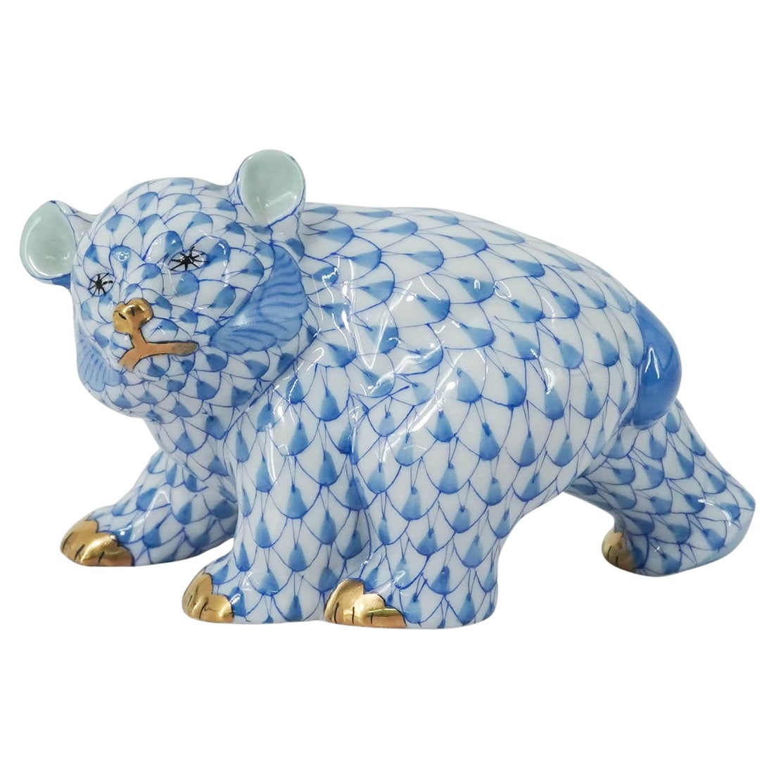 Herend Porcelain Blue Fishnet Bear Cub: Herend Porcelain Blue Fishnet Bear Cub 20th century, Hungarian A Herend porcelain bear cub figurine, number 15362 in the blue fishnet color way. Marked on bottom with Herend hallmarks, "15362/VHB A 93