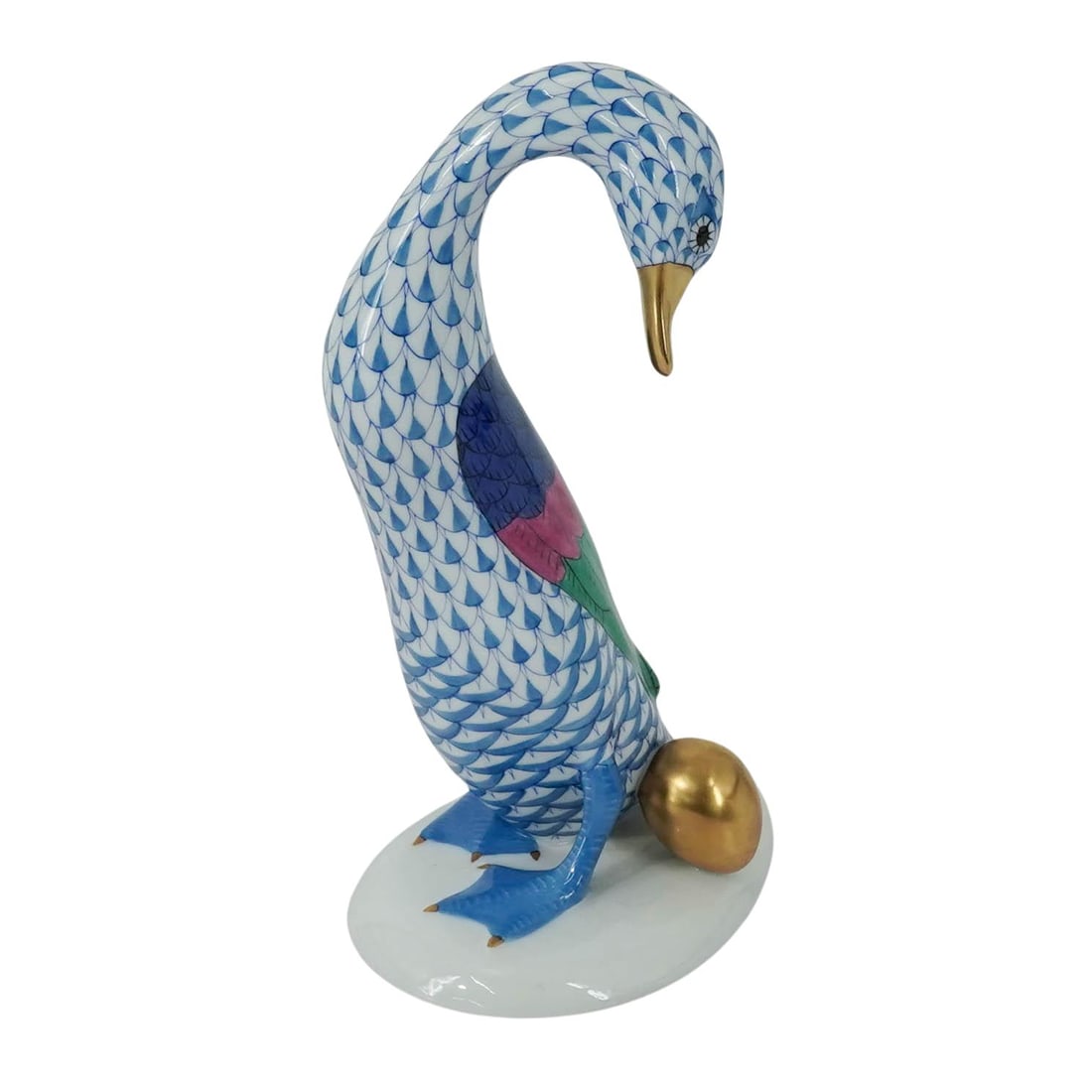 Herend Porcelain Blue Fishnet "Goose w/ Golden Egg": Herend Porcelain Blue Fishnet "Goose w/ Golden Egg" 20th century, Hungarian A Herend porcelain figurine of a goose with a golden egg in the blue fishnet color way. Marked on bottom with Herend